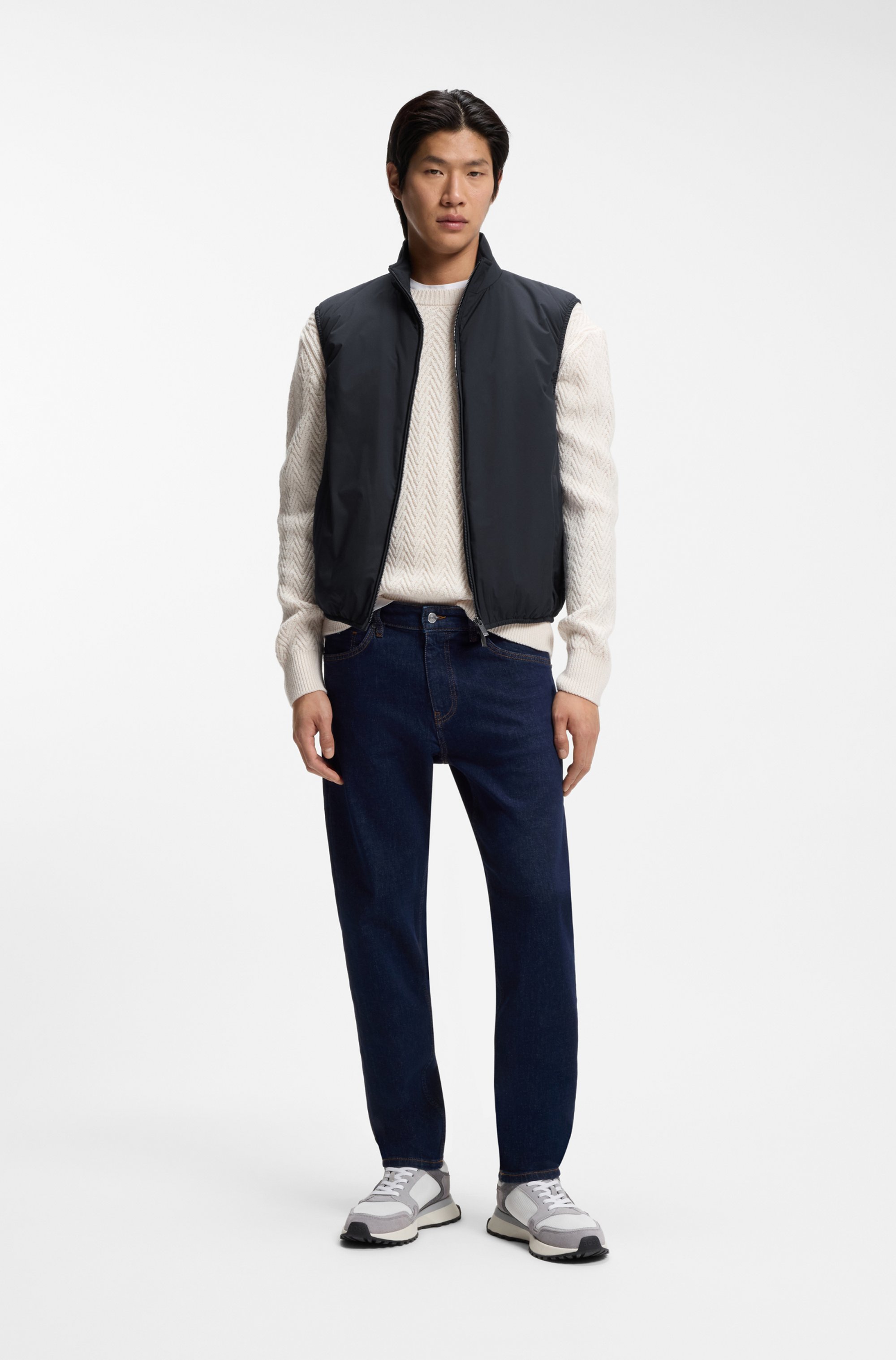 Water-repellent gilet with knitted trims