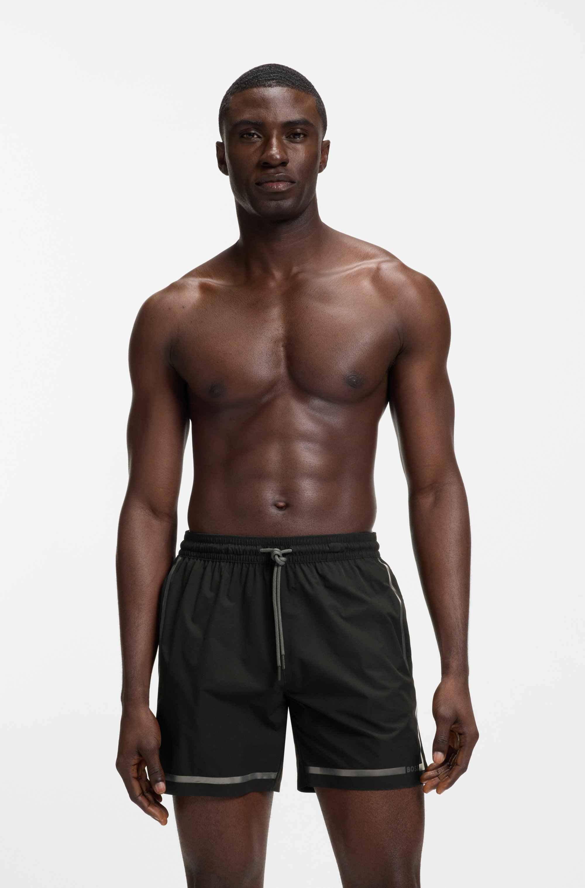 Swim shorts with logo stripe print