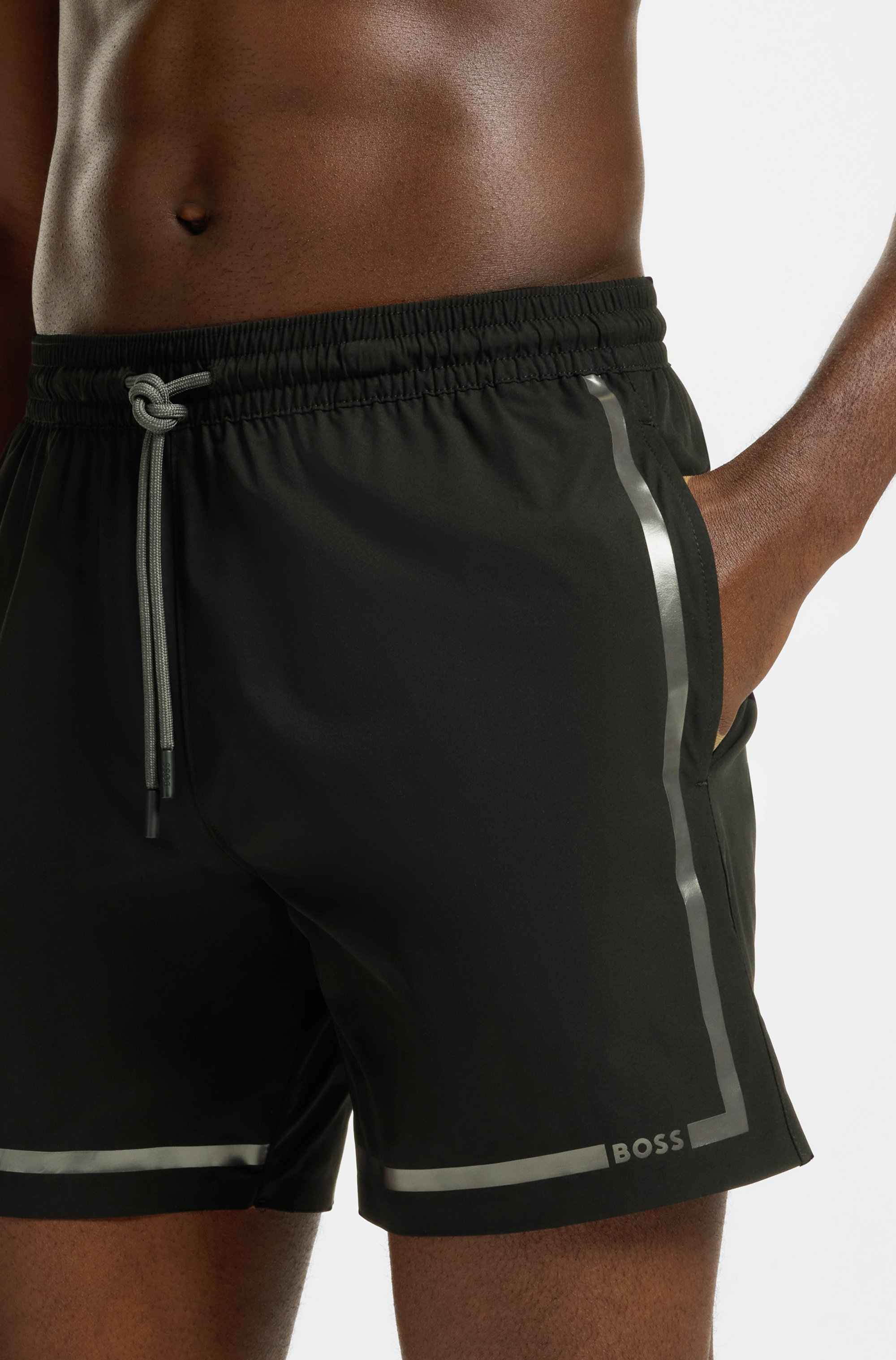 Swim shorts with logo stripe print