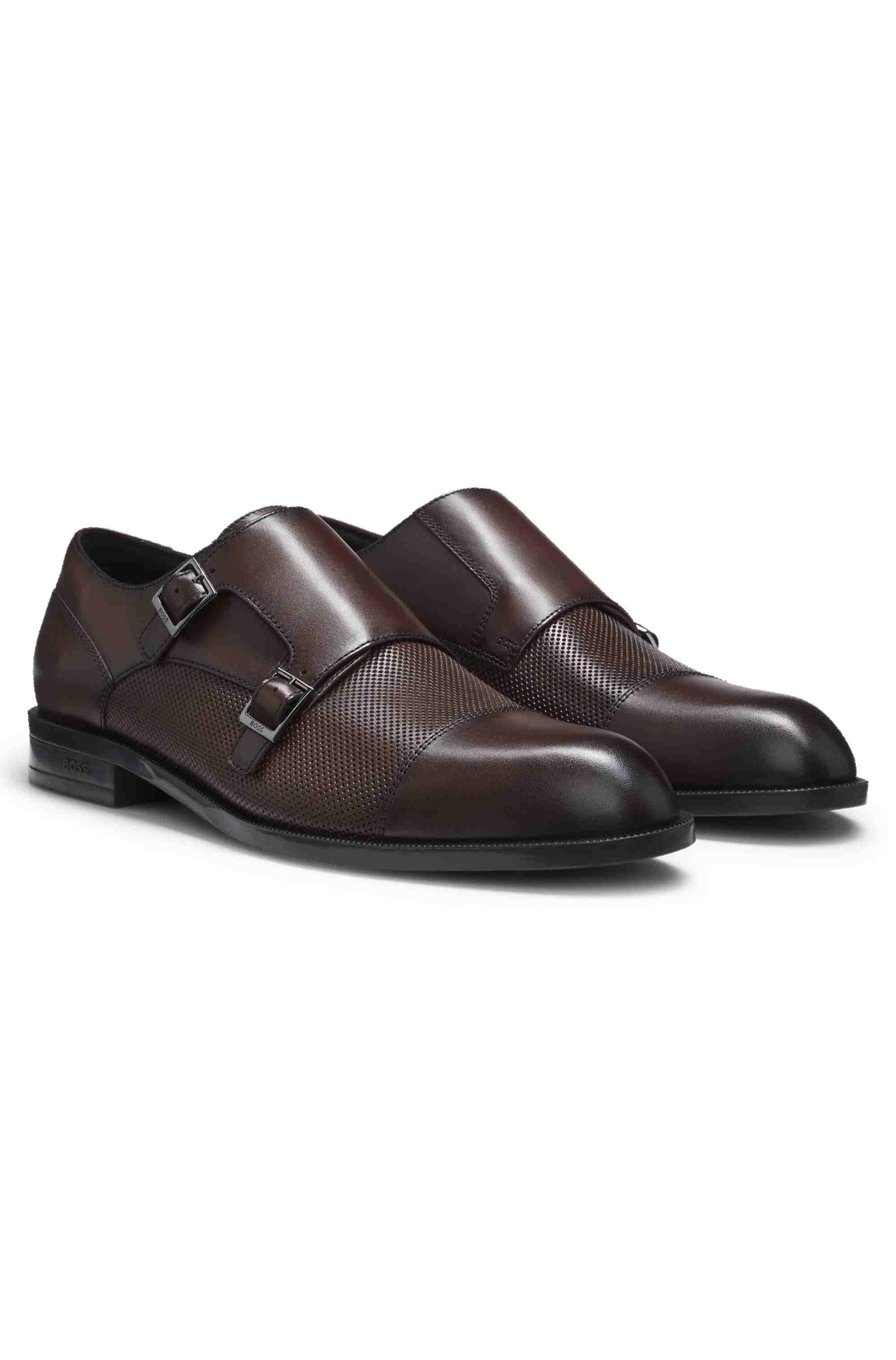 Double monk shoes in leather with perforated detail