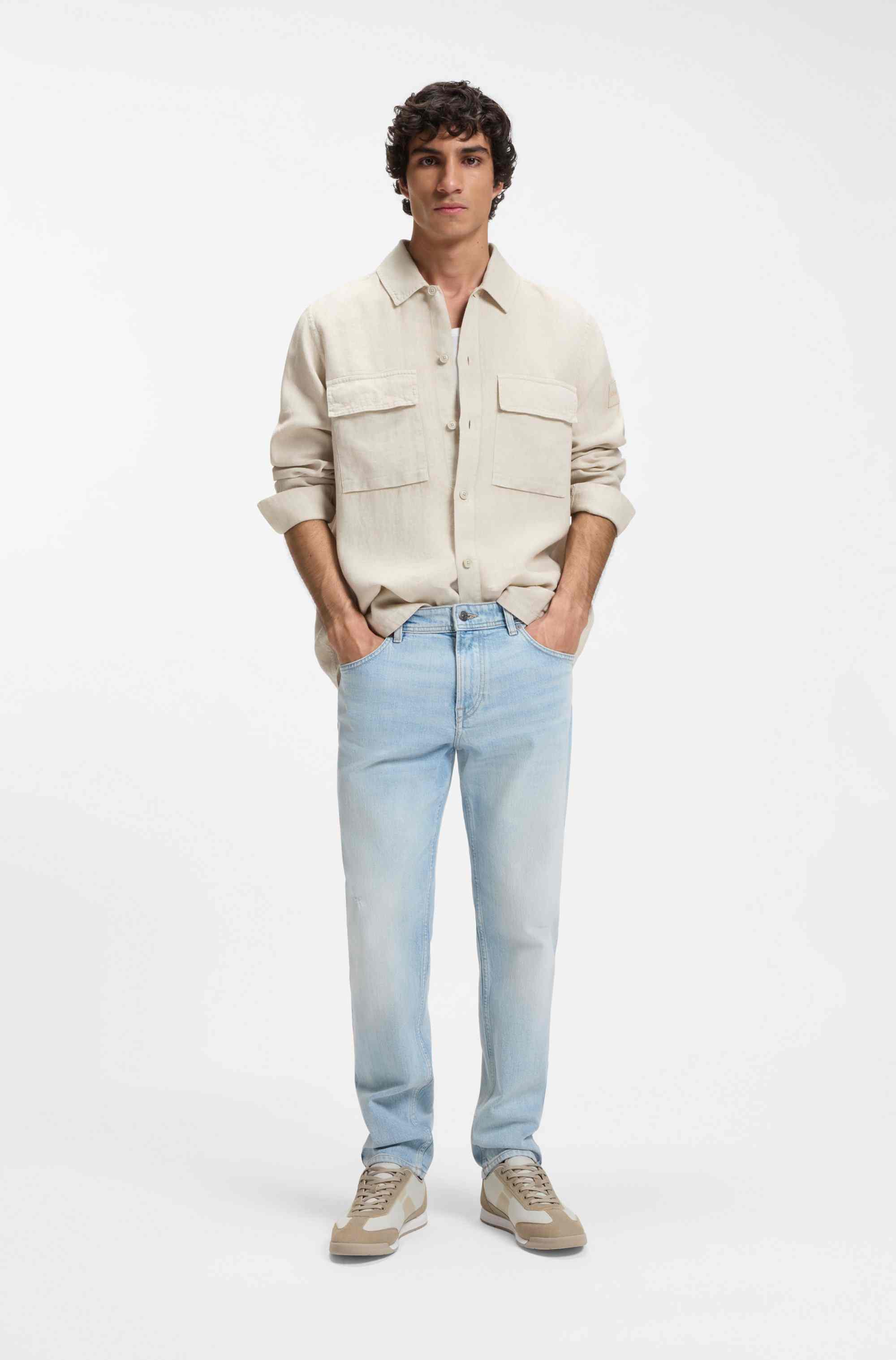 Mixed-material trainers with ridged outsole