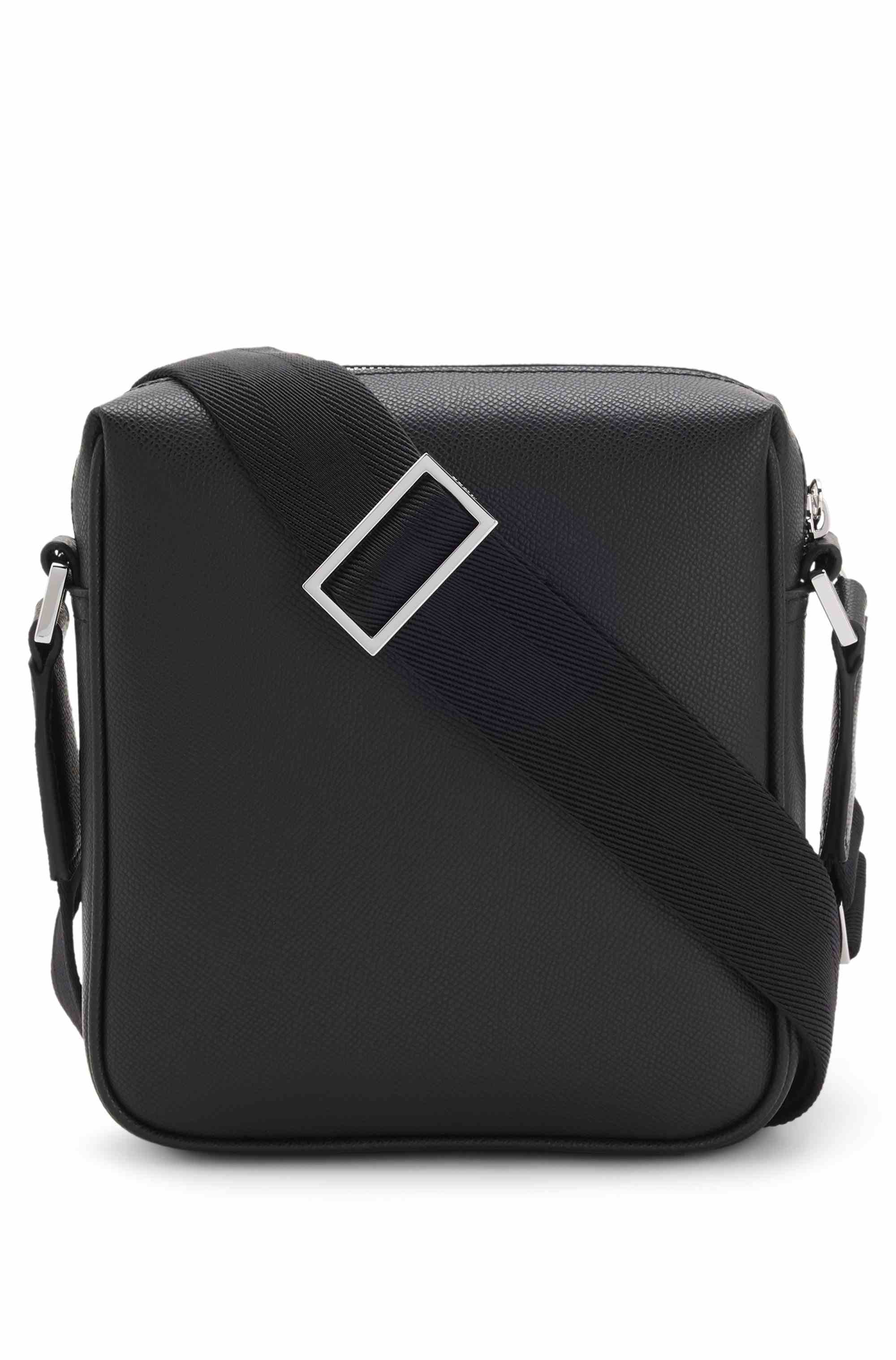 Grained reporter bag with logo lettering