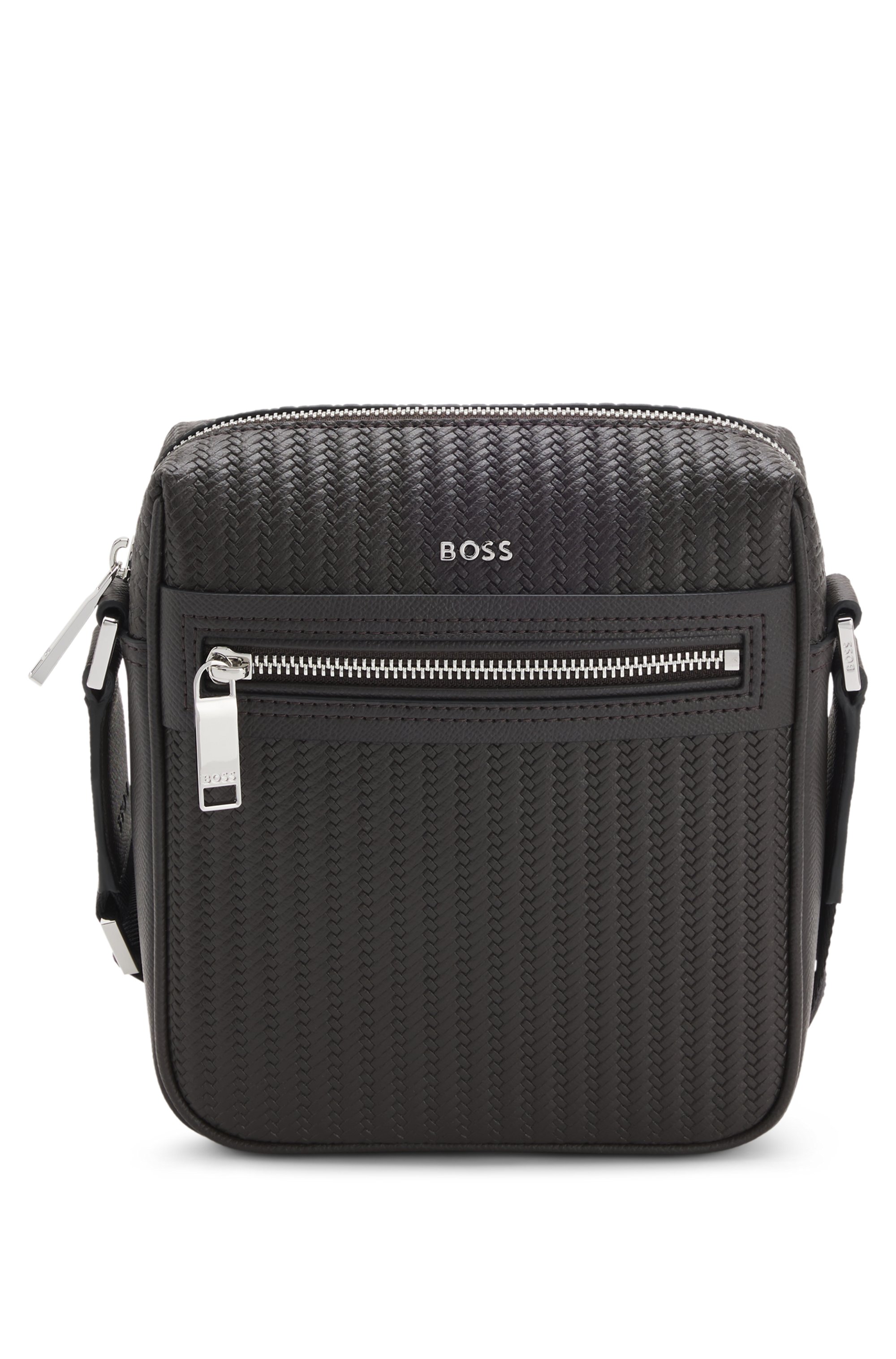 Reporter bag with embossed pattern