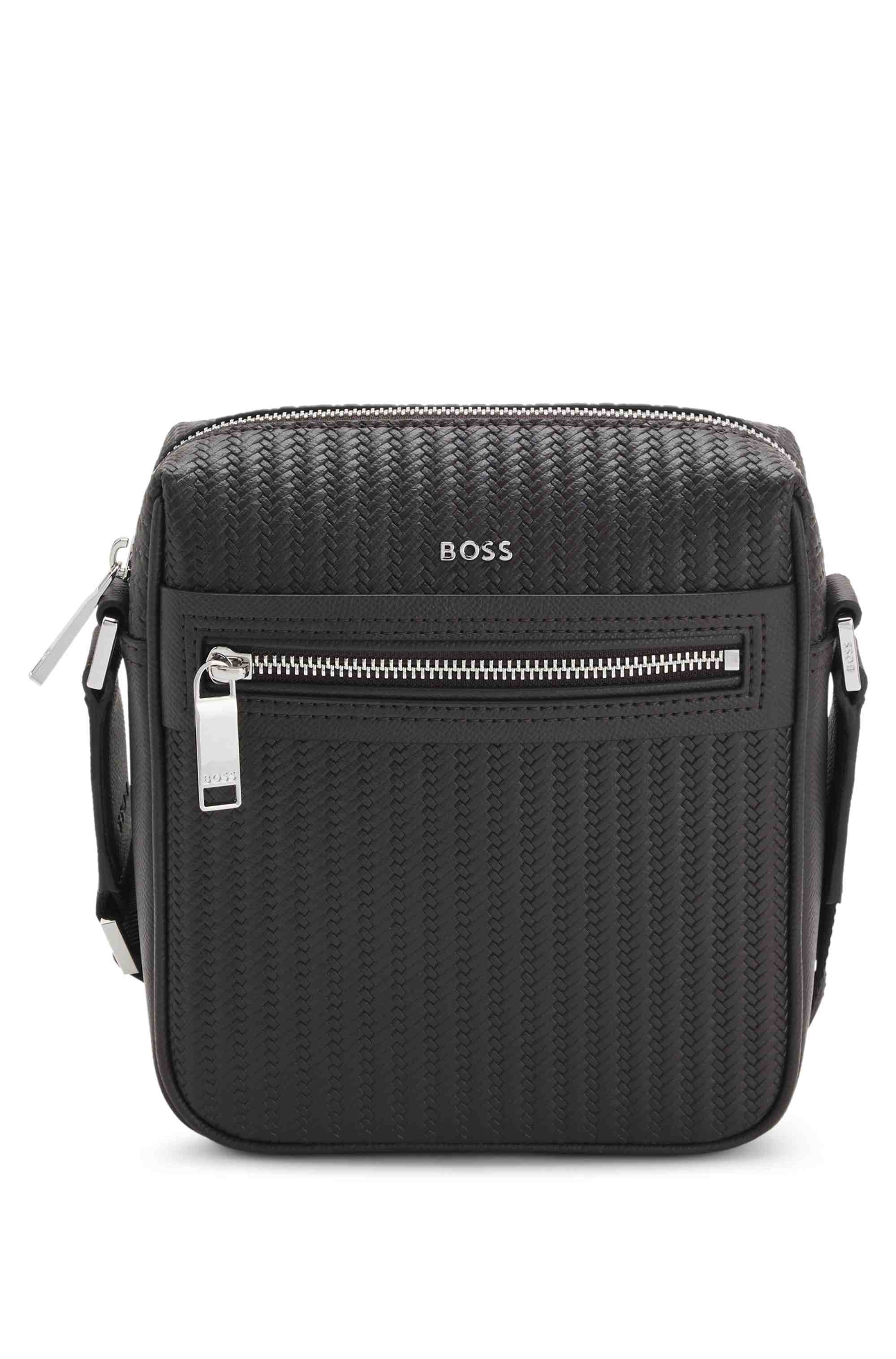 Reporter bag with embossed pattern