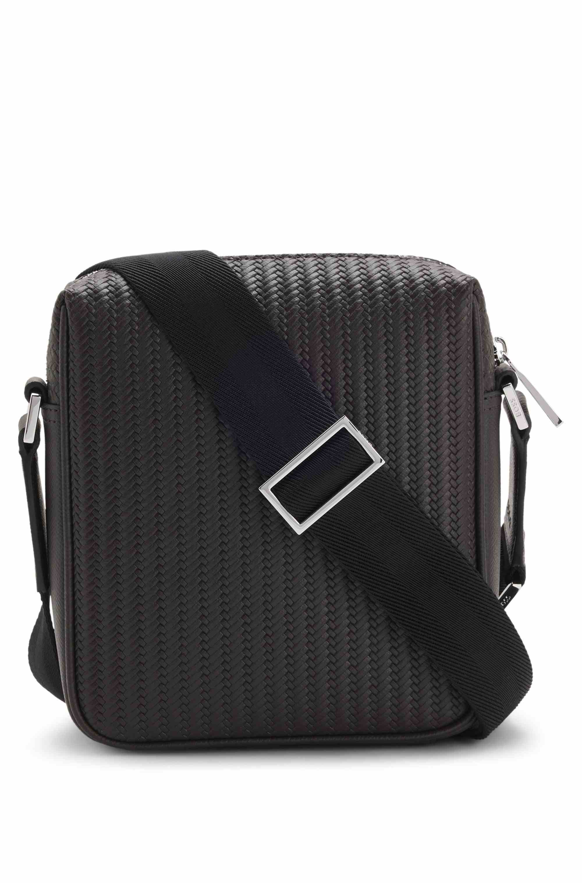 Reporter bag with embossed pattern