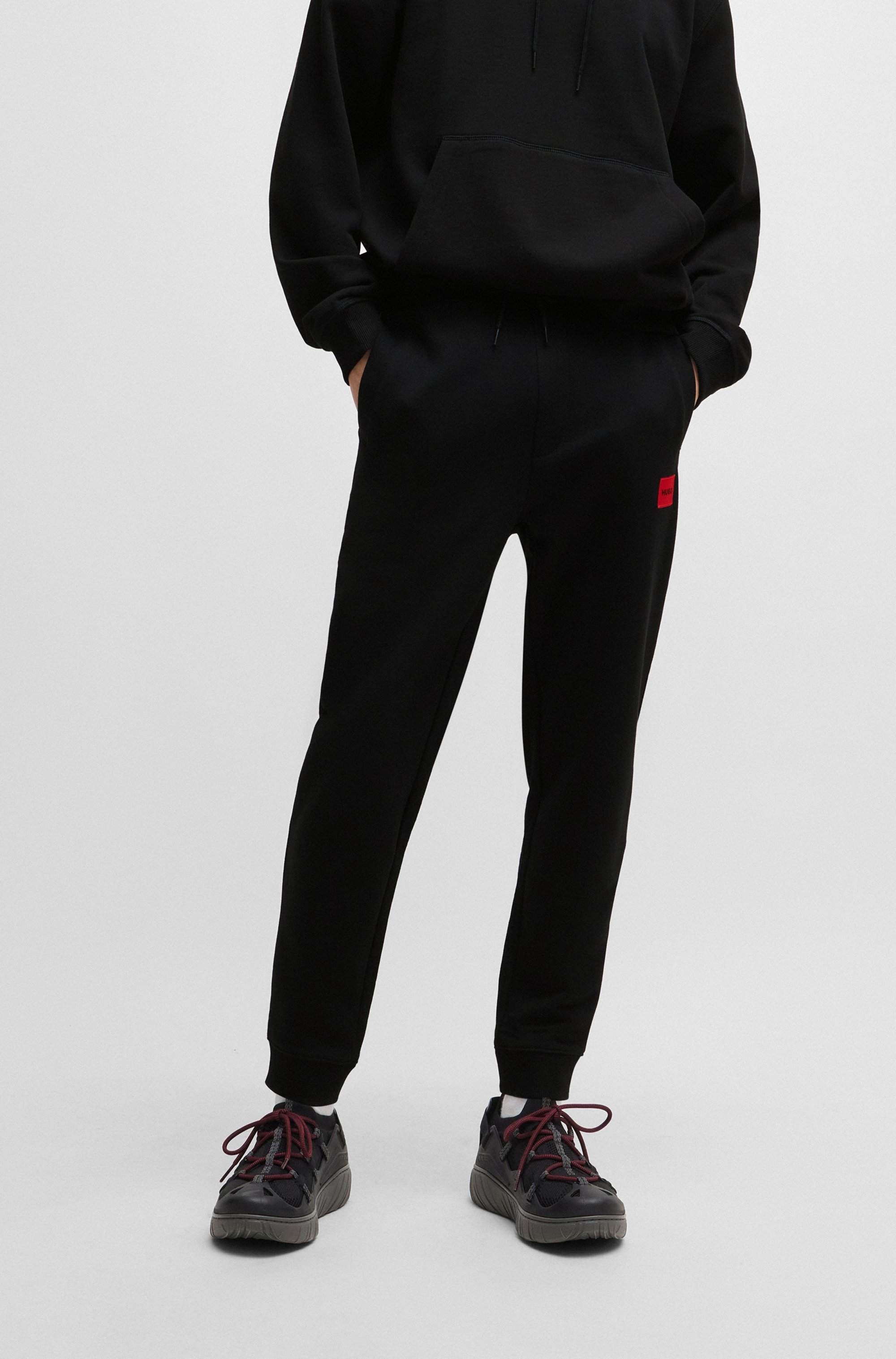 Cotton-terry tracksuit bottoms with logo label