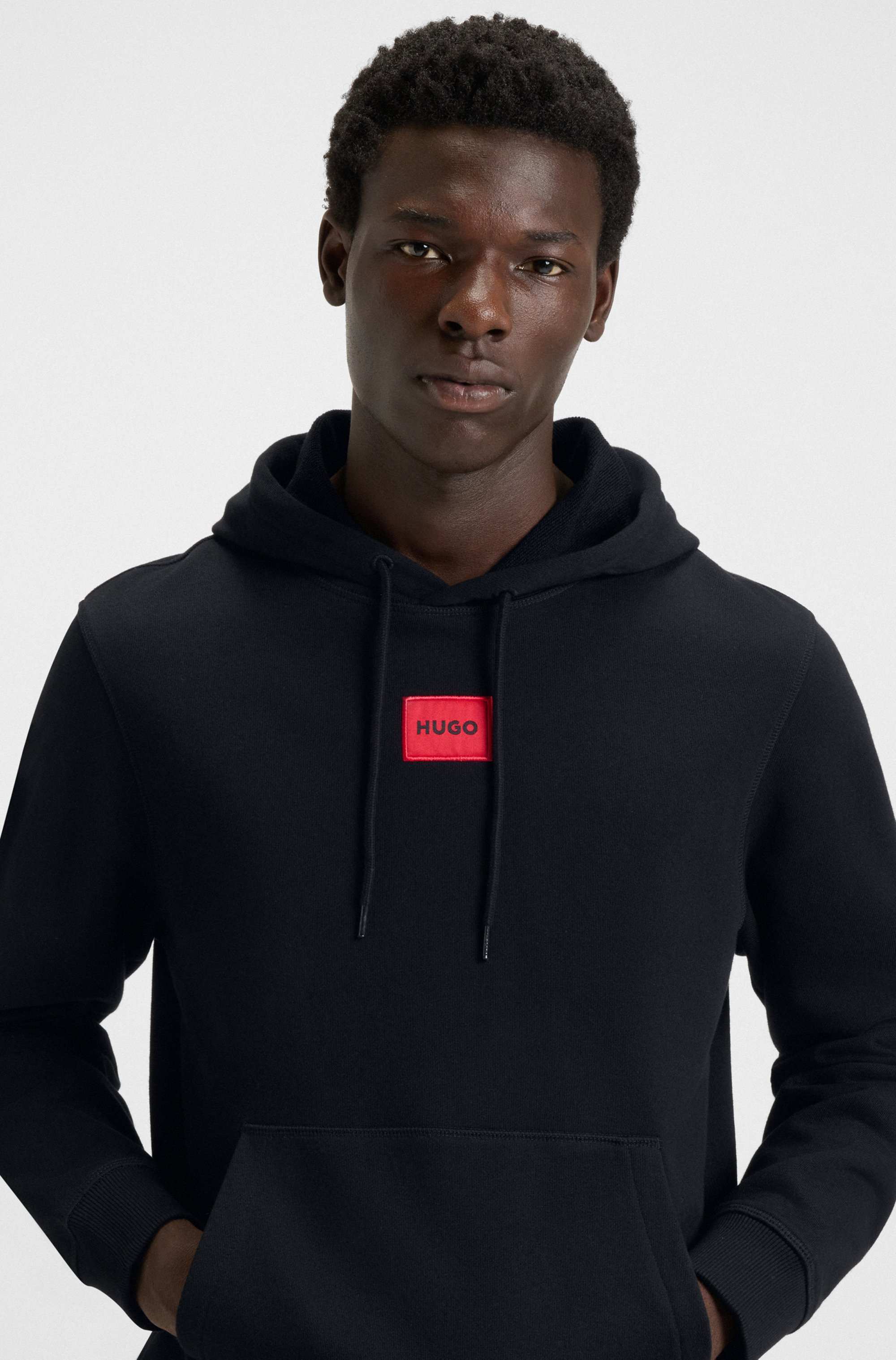 Cotton-terry hoodie with red logo label