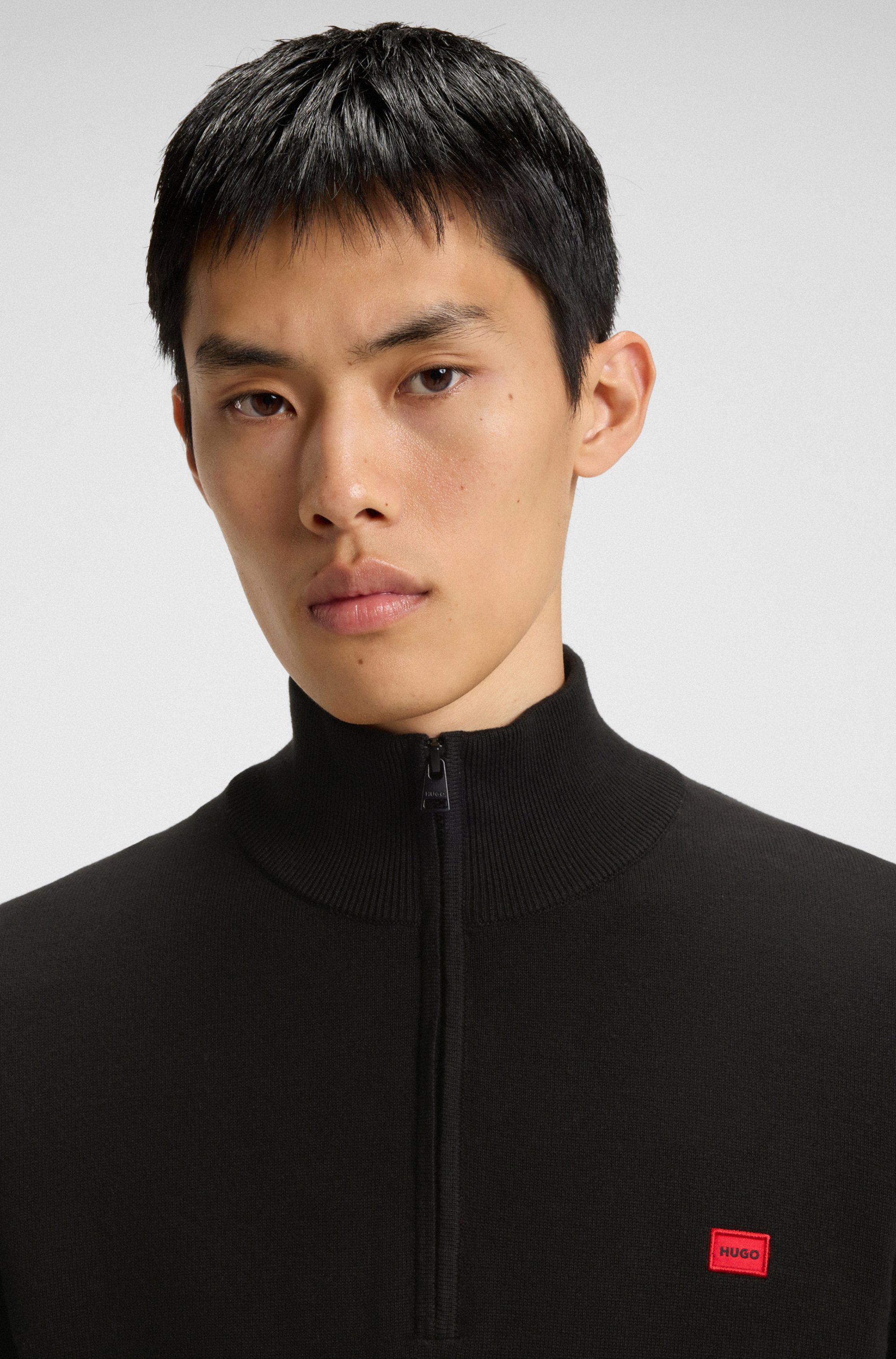 Zip-neck sweater in cotton with red logo label