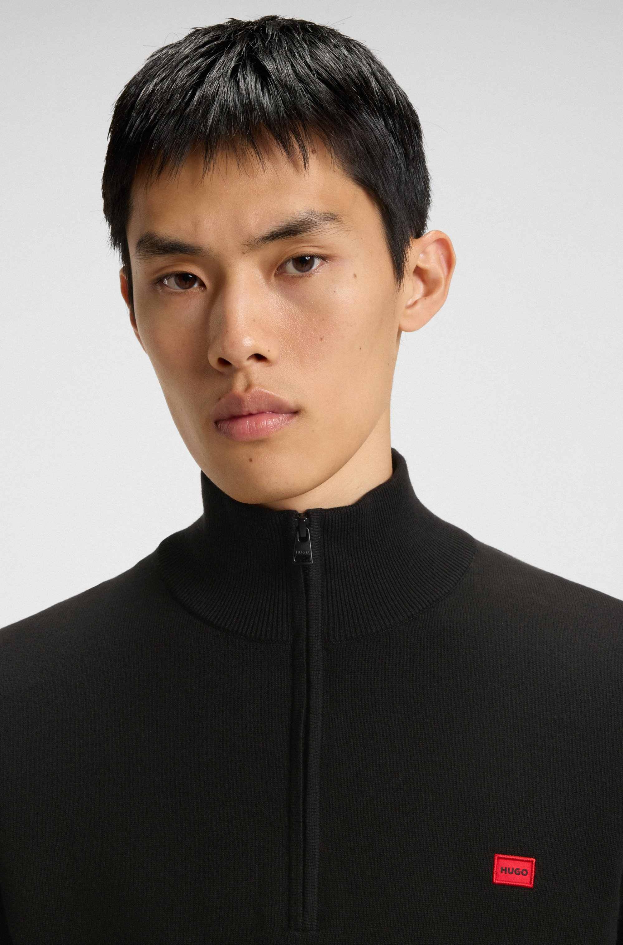 Zip-neck sweater in cotton with red logo label