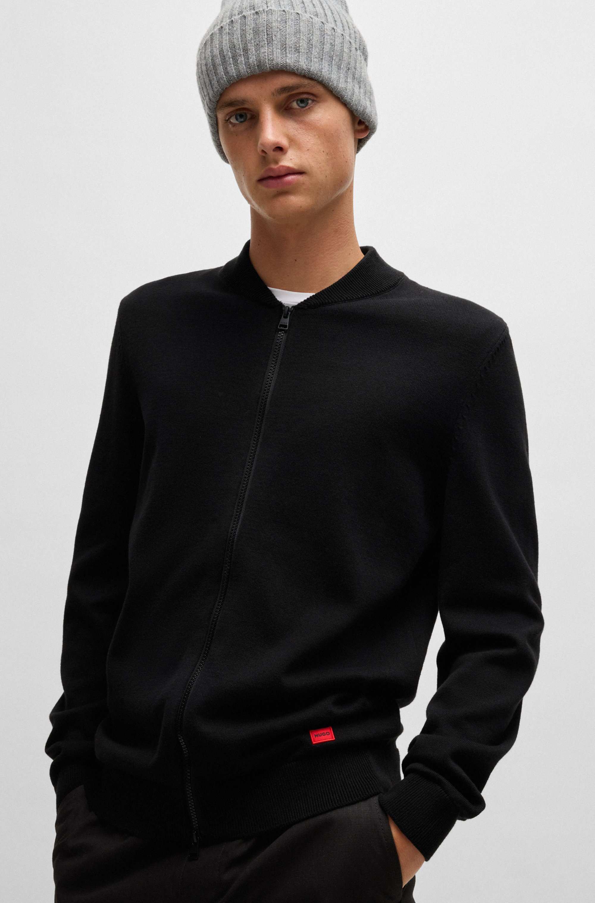 Knitted-cotton bomber-style cardigan with red logo label