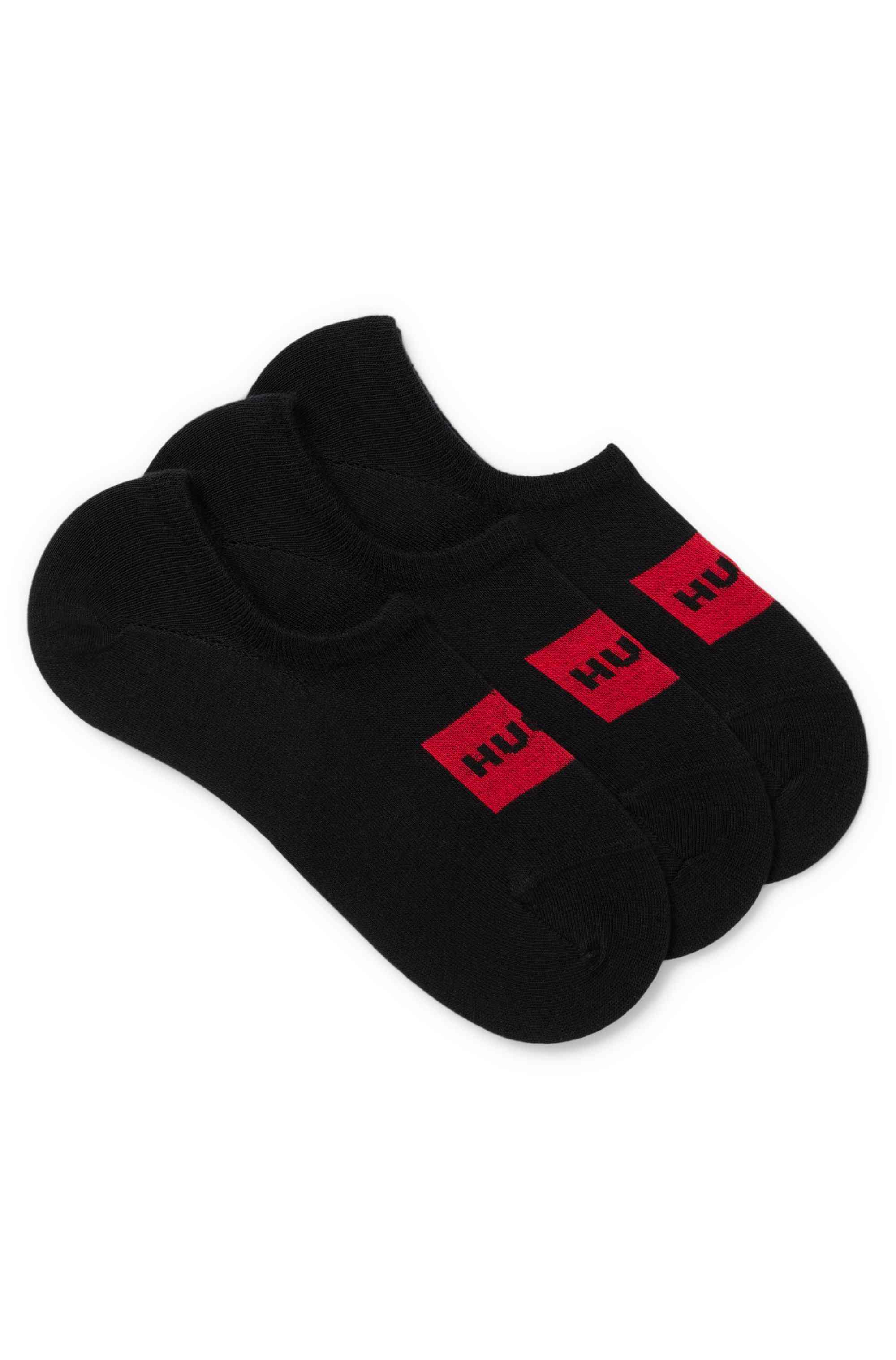 Three-pack of invisible socks with red logo labels