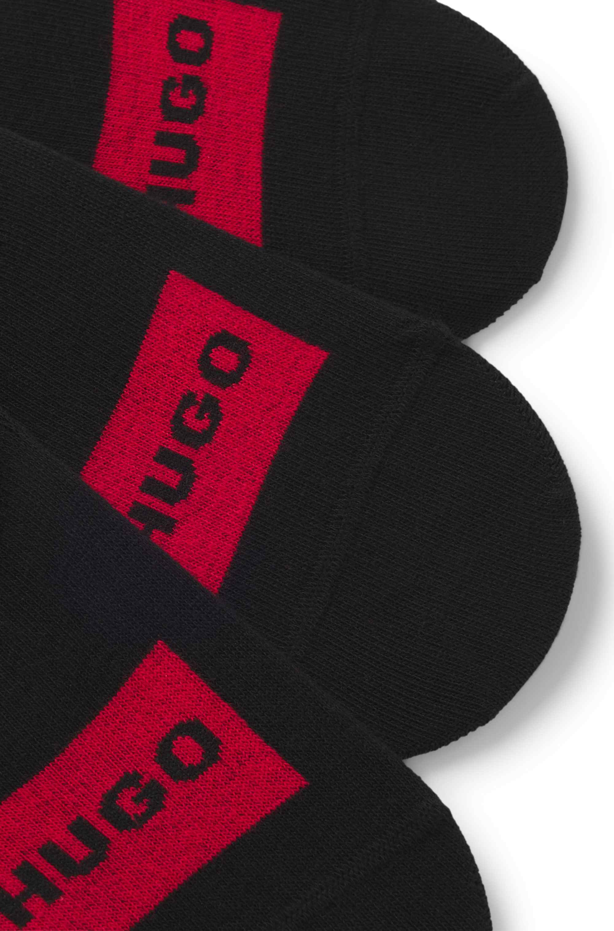Three-pack of invisible socks with red logos