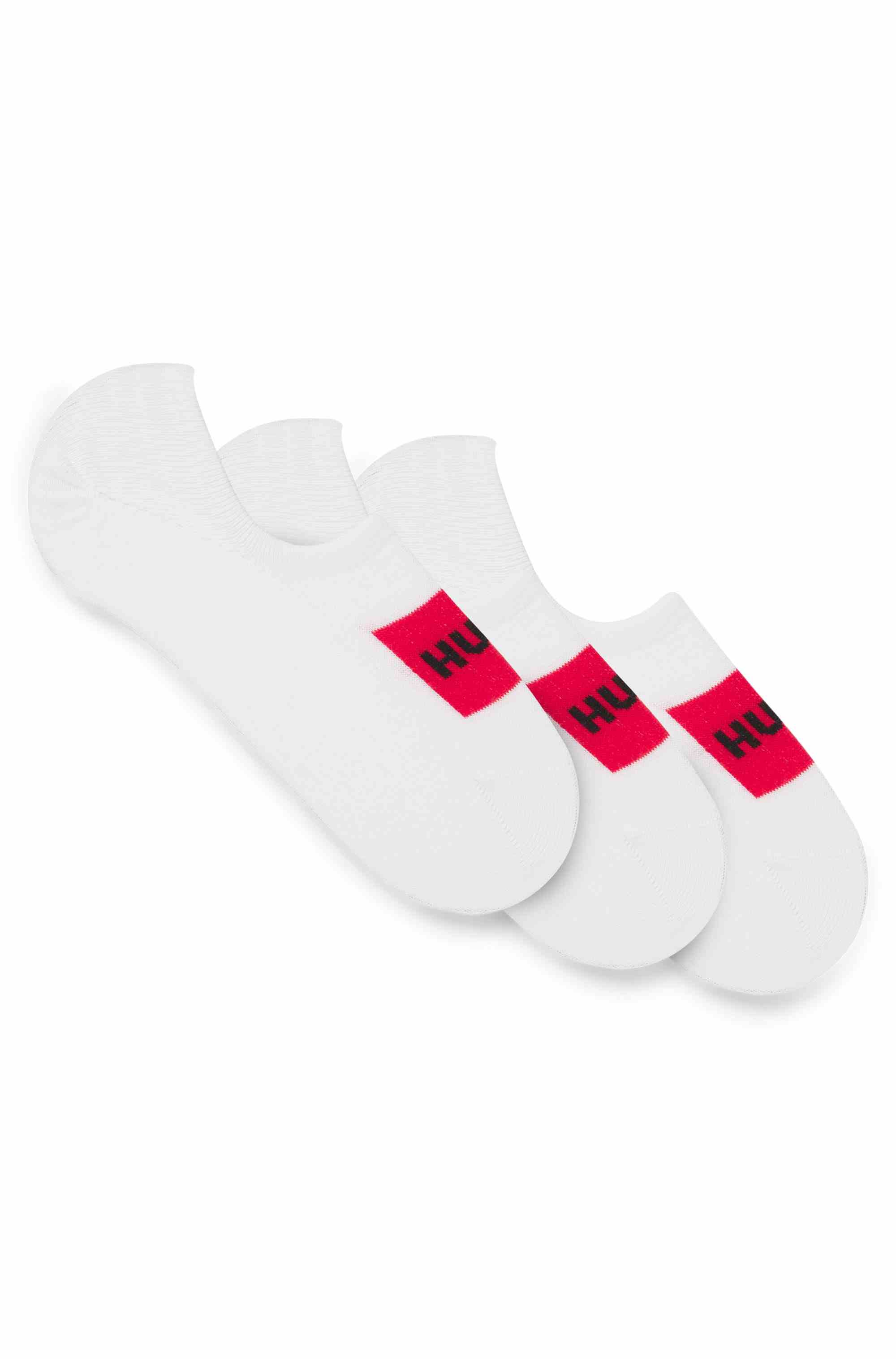 Three-pack of invisible socks with red logo labels