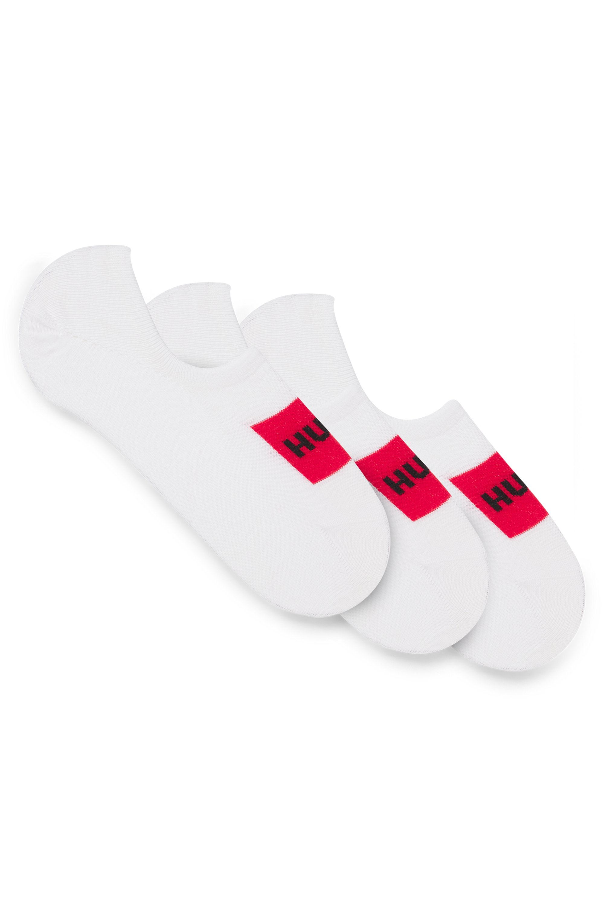 Three-pack of invisible socks with red logo labels