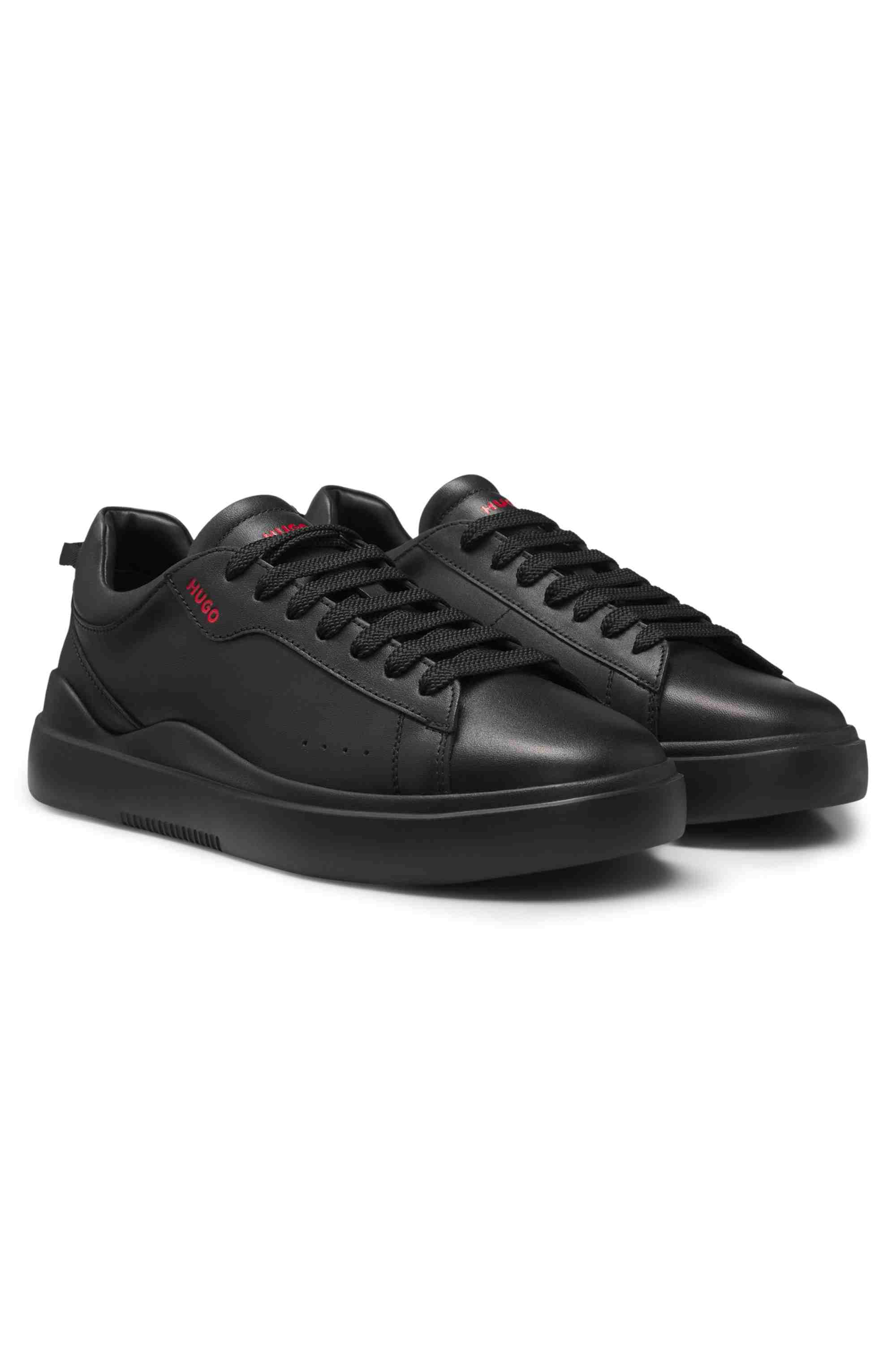 Leather trainers with red logo