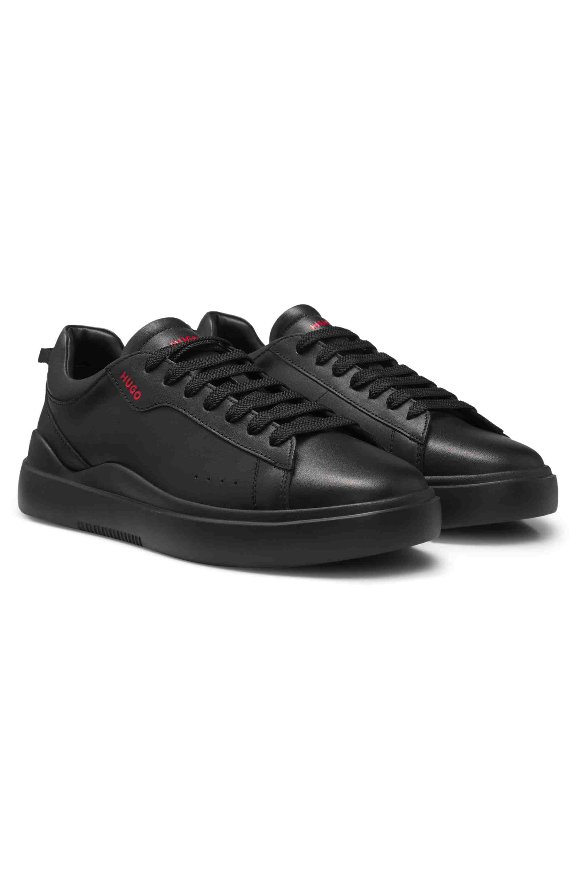 Leather trainers with red logo