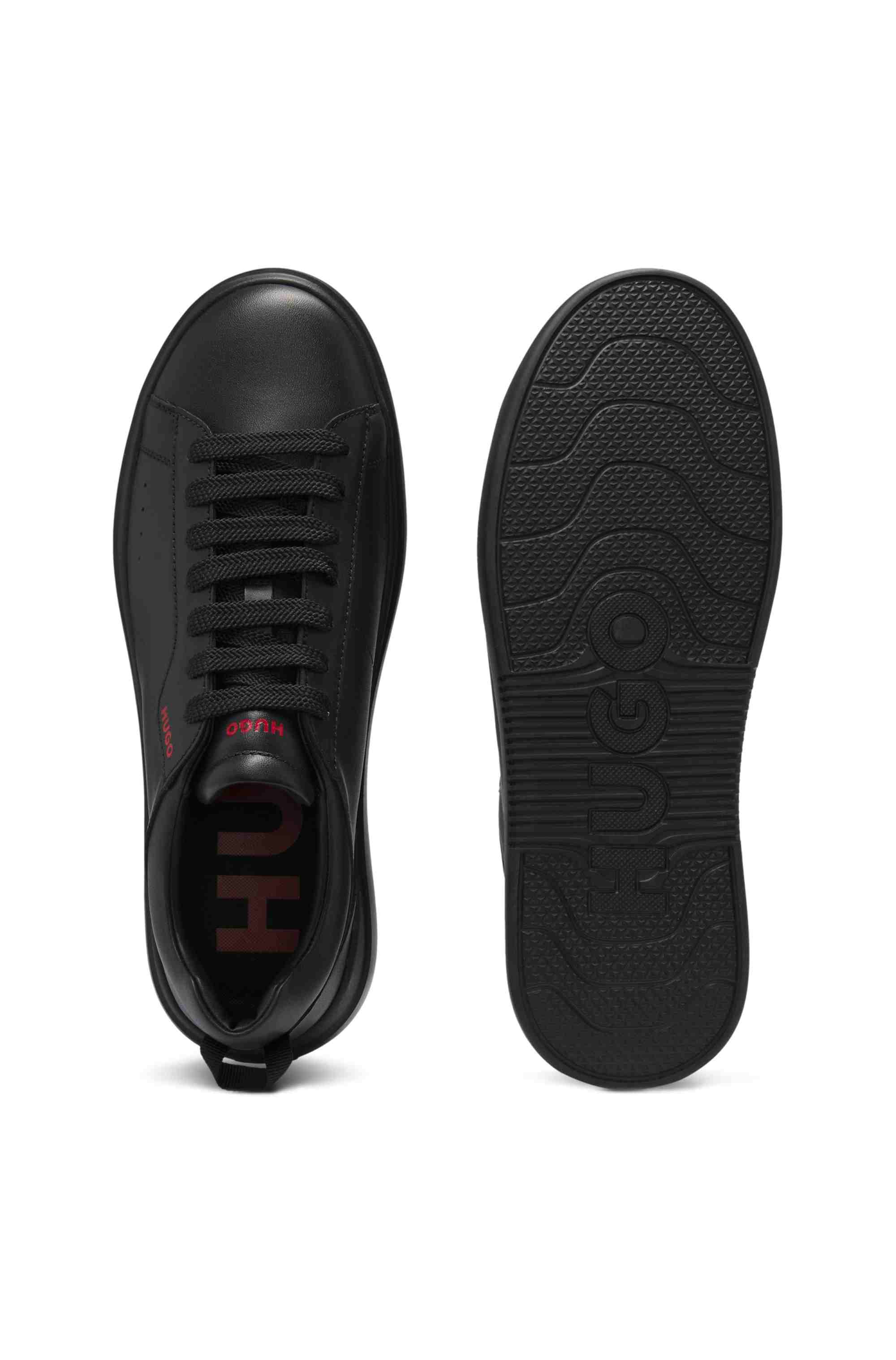 Leather trainers with red logo detail
