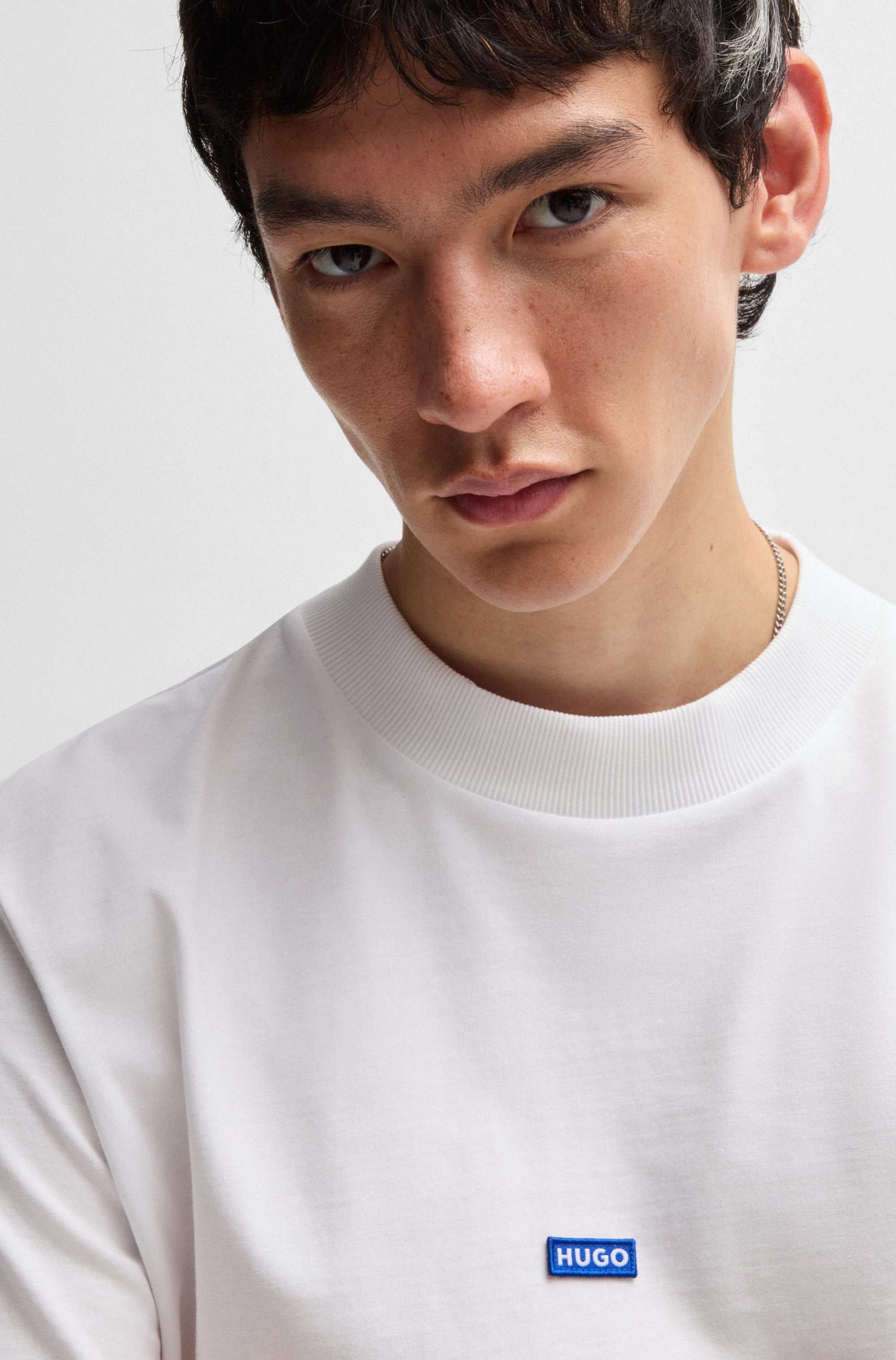 Regular-fit cotton-jersey T-shirt with blue logo patch