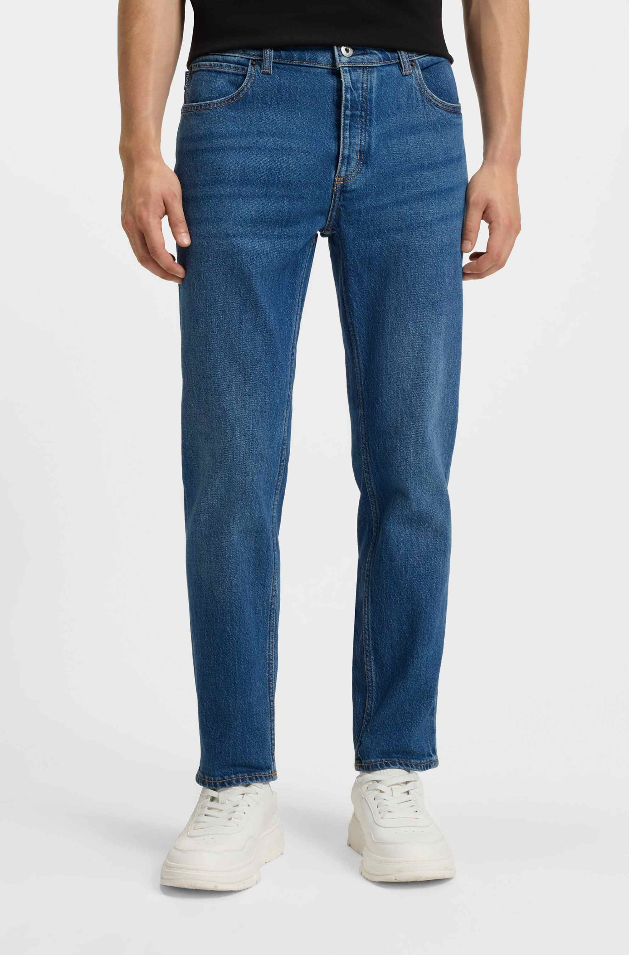 Tapered-fit jeans in mid-blue stretch denim