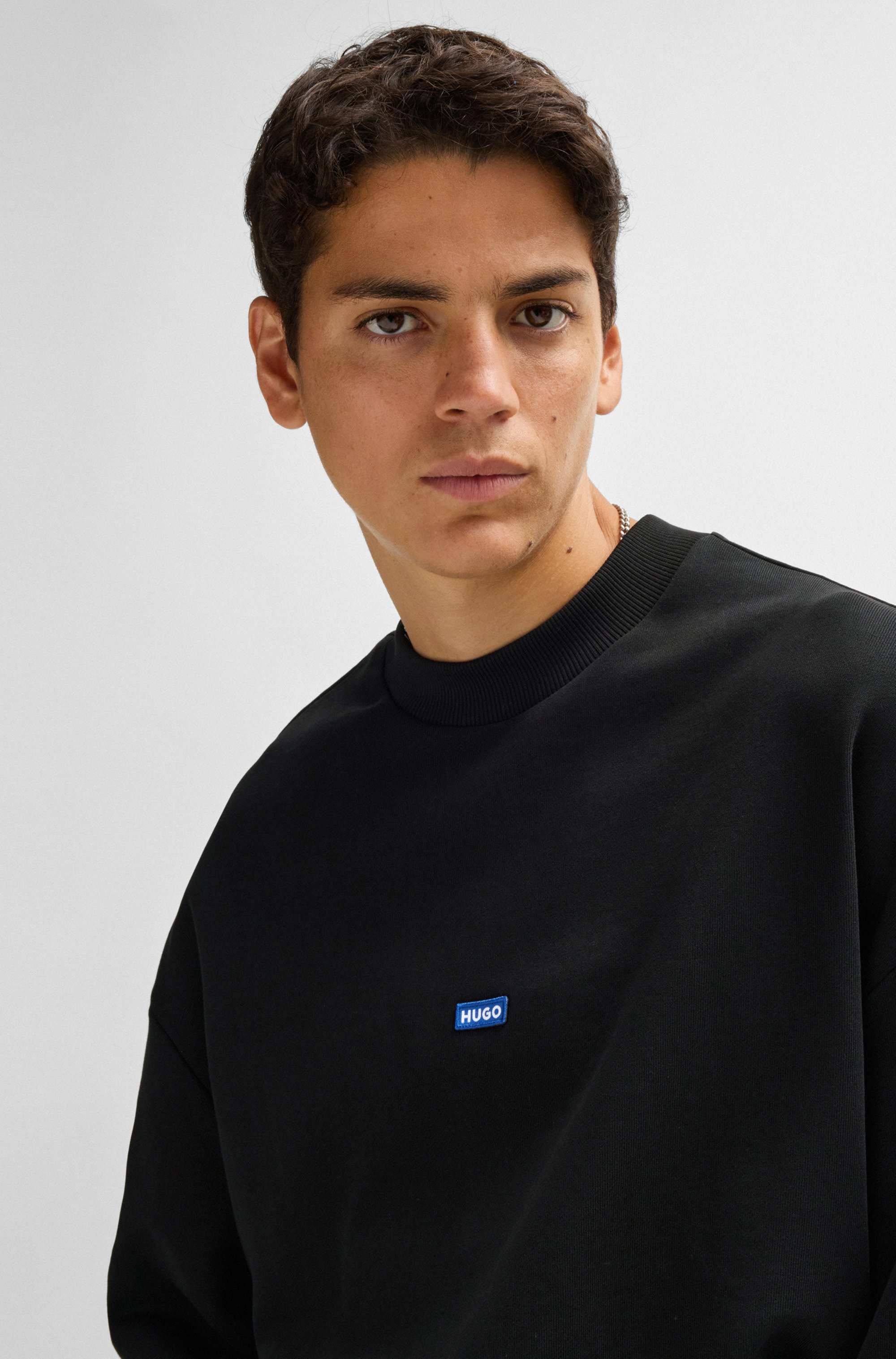 Cotton-terry sweatshirt with blue logo patch