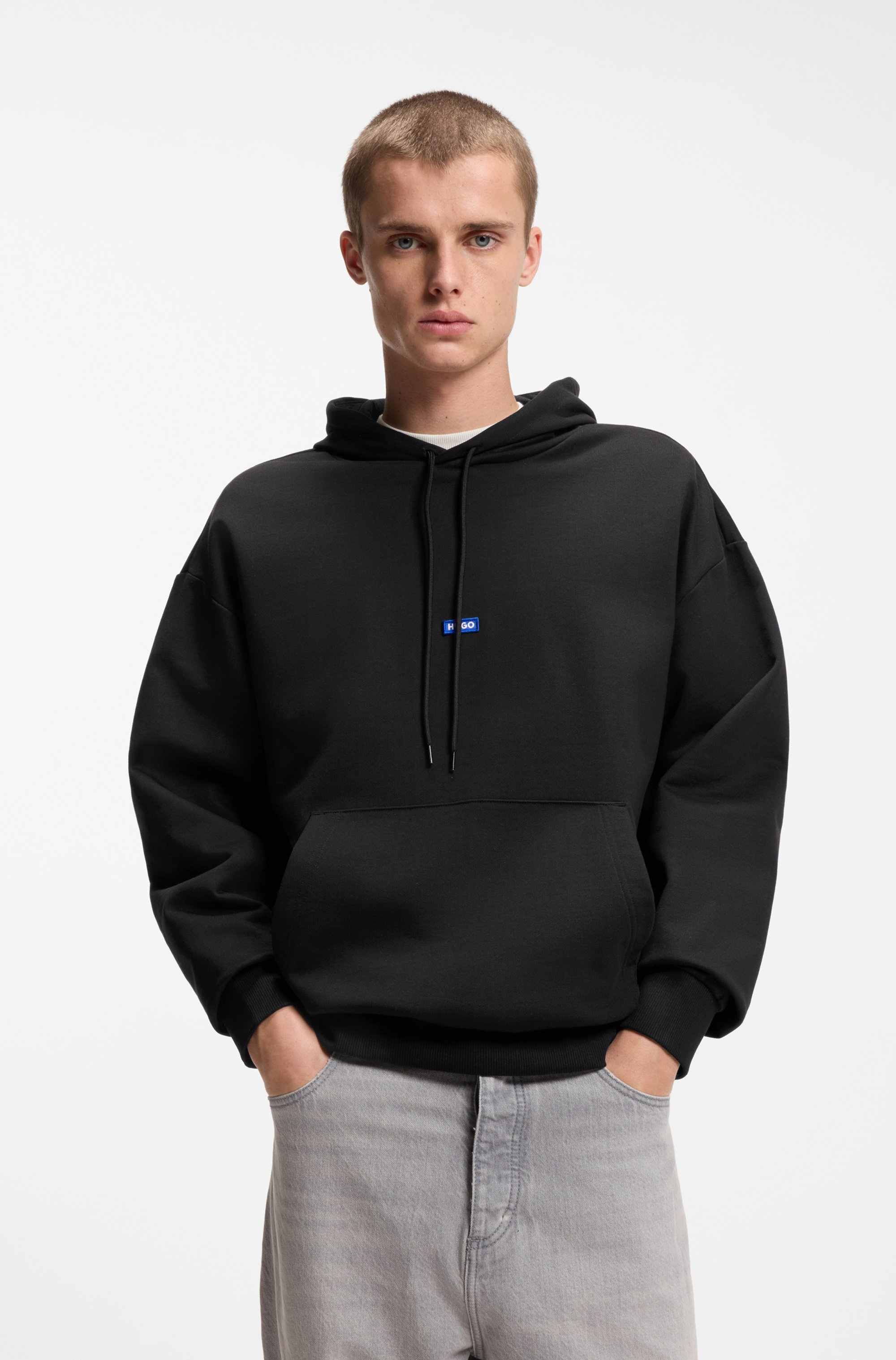 Cotton-terry hoodie with blue logo patch