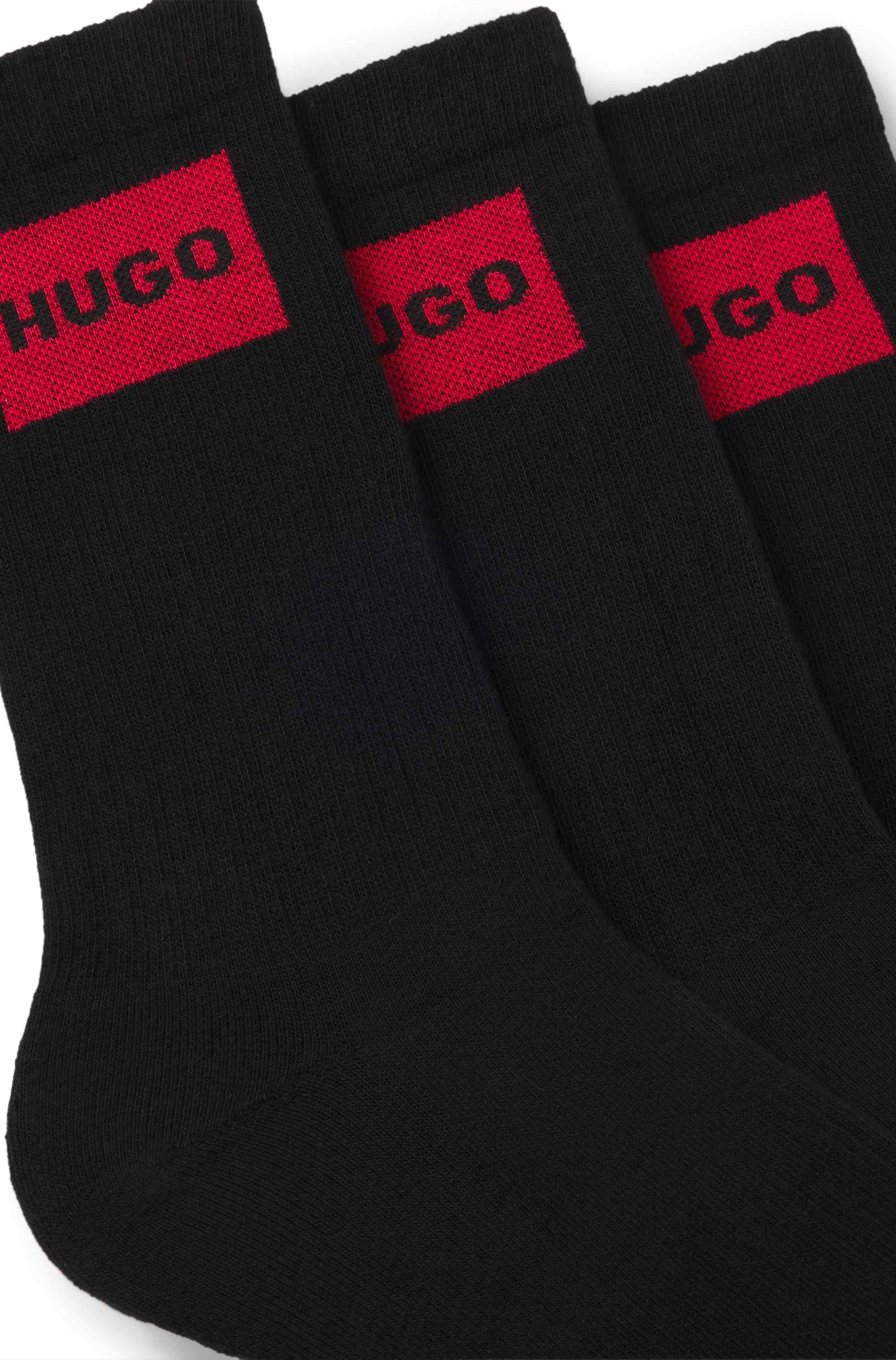 Three-pack of short socks with red logo labels