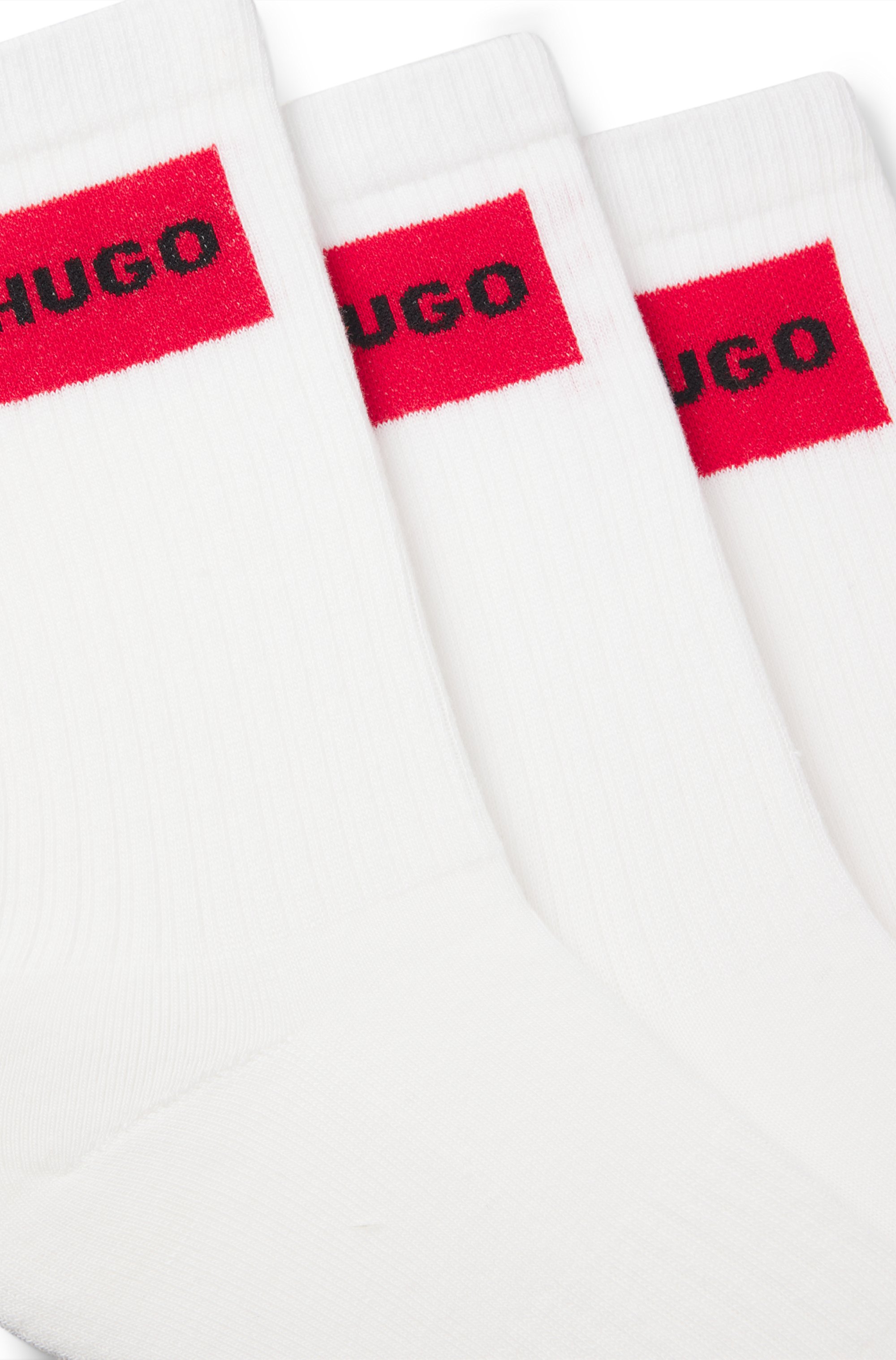 Three-pack of short socks with red logo labels