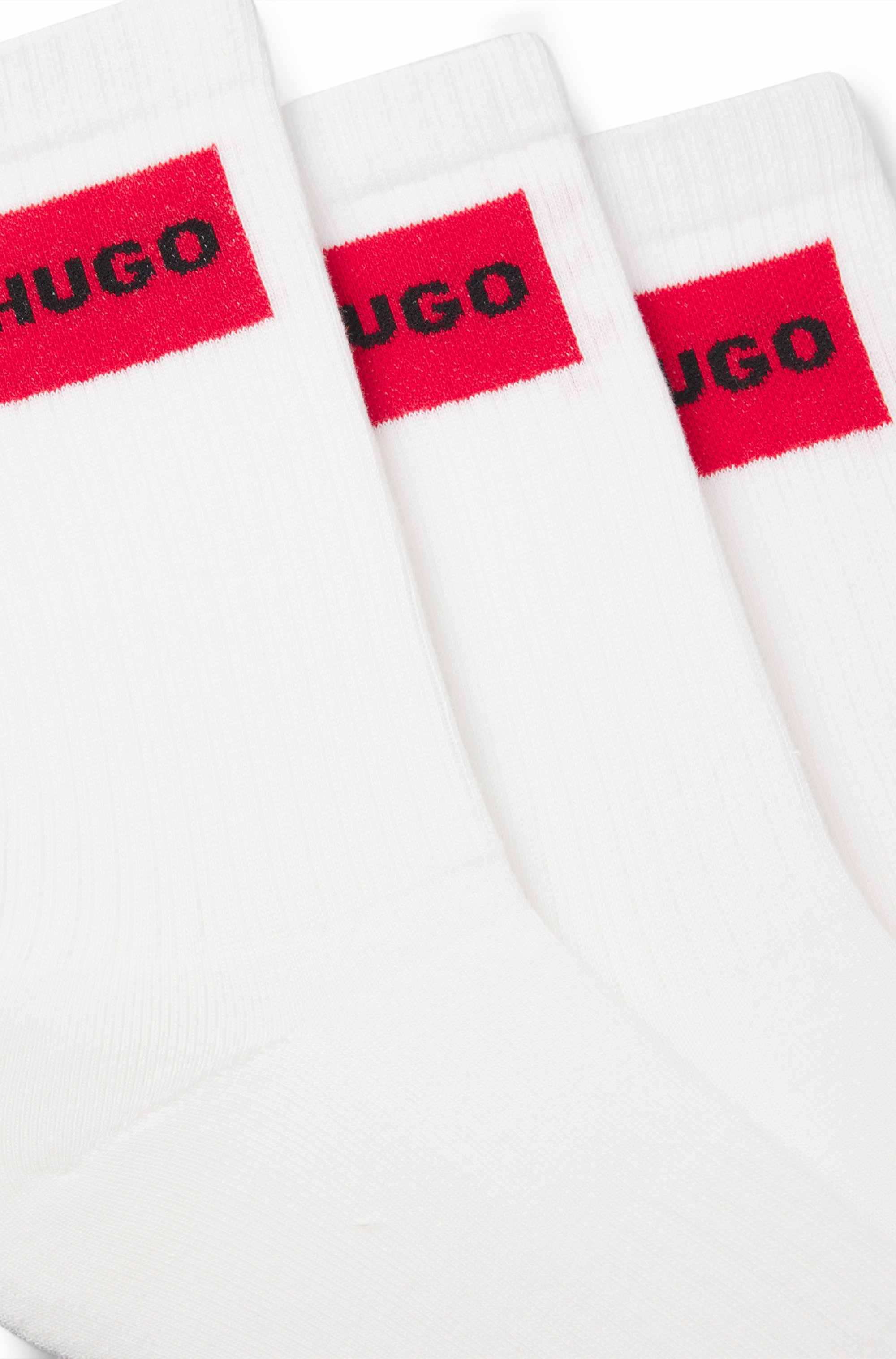 Three-pack of short socks with red logo labels