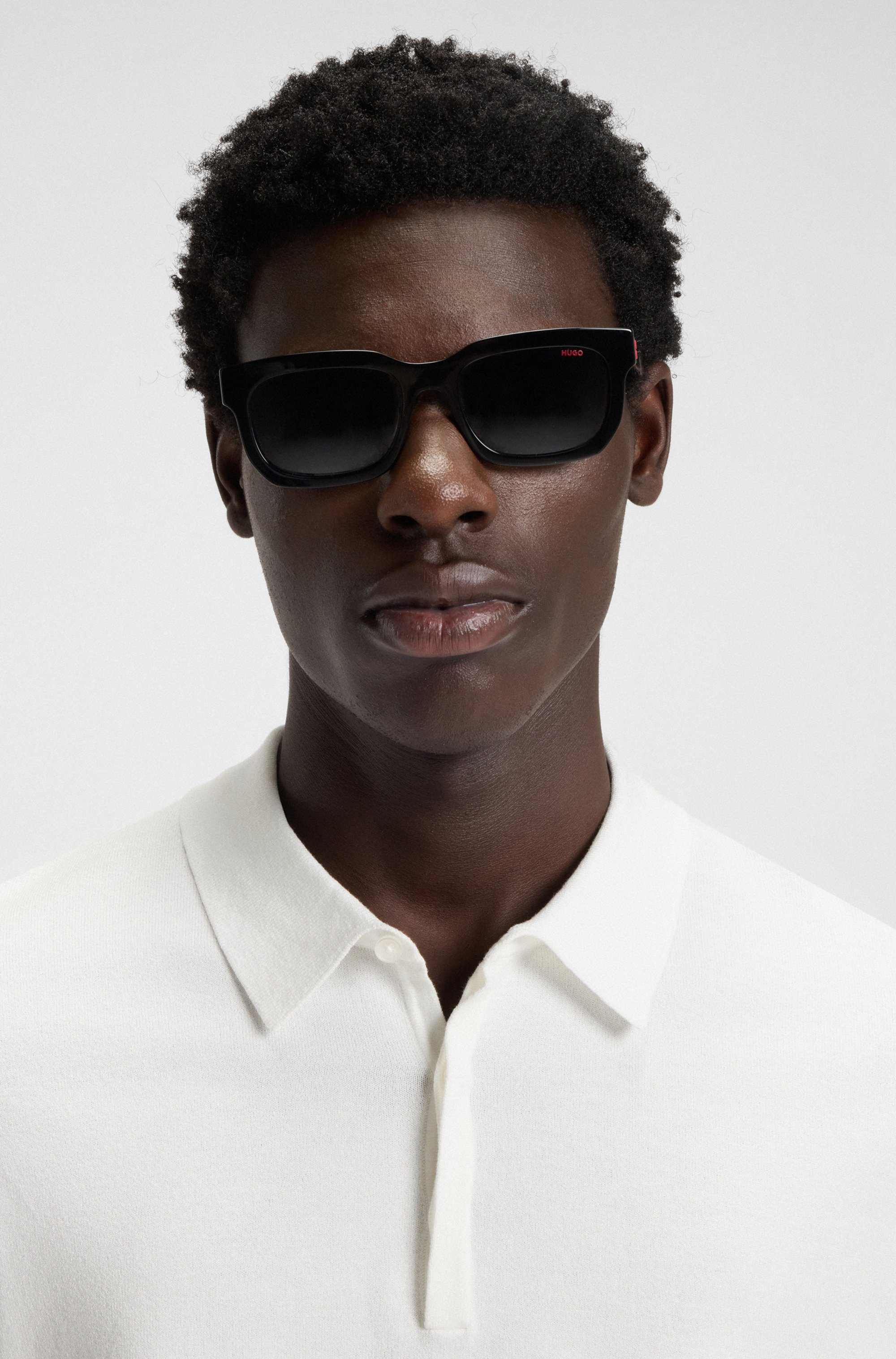 Slim-fit knit polo with rear logo
