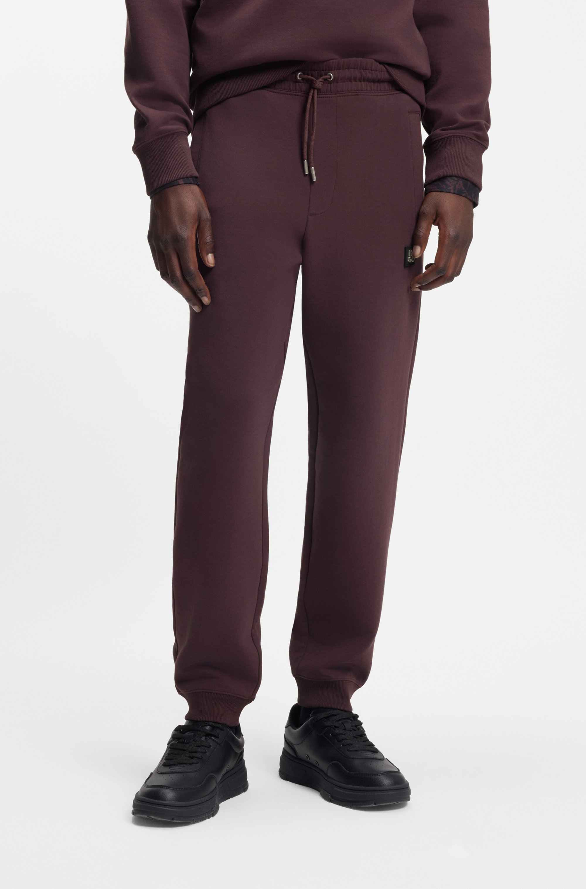 Cotton-blend tracksuit bottoms with stacked logo