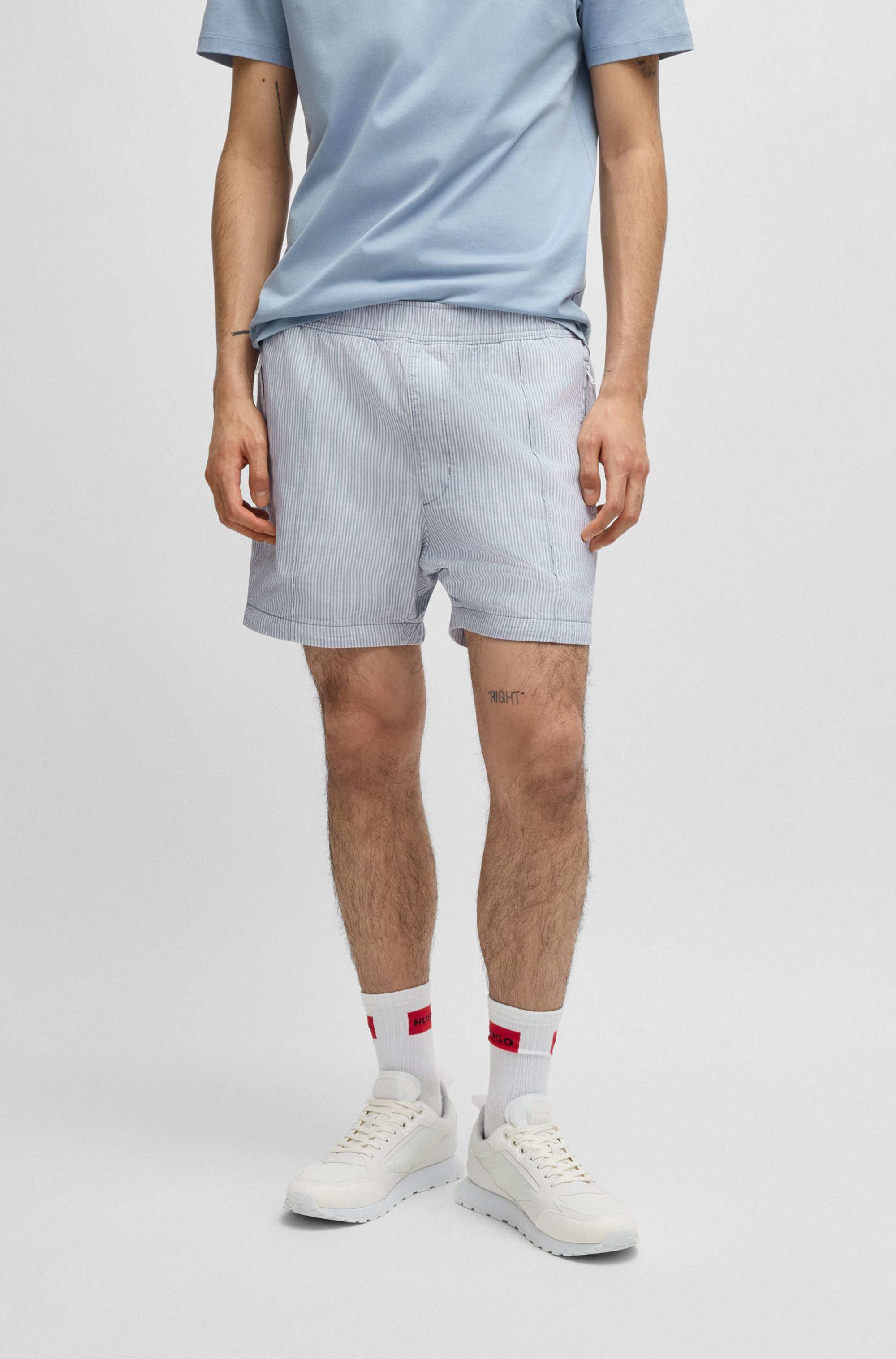 Cotton-blend shorts with vertical stripe