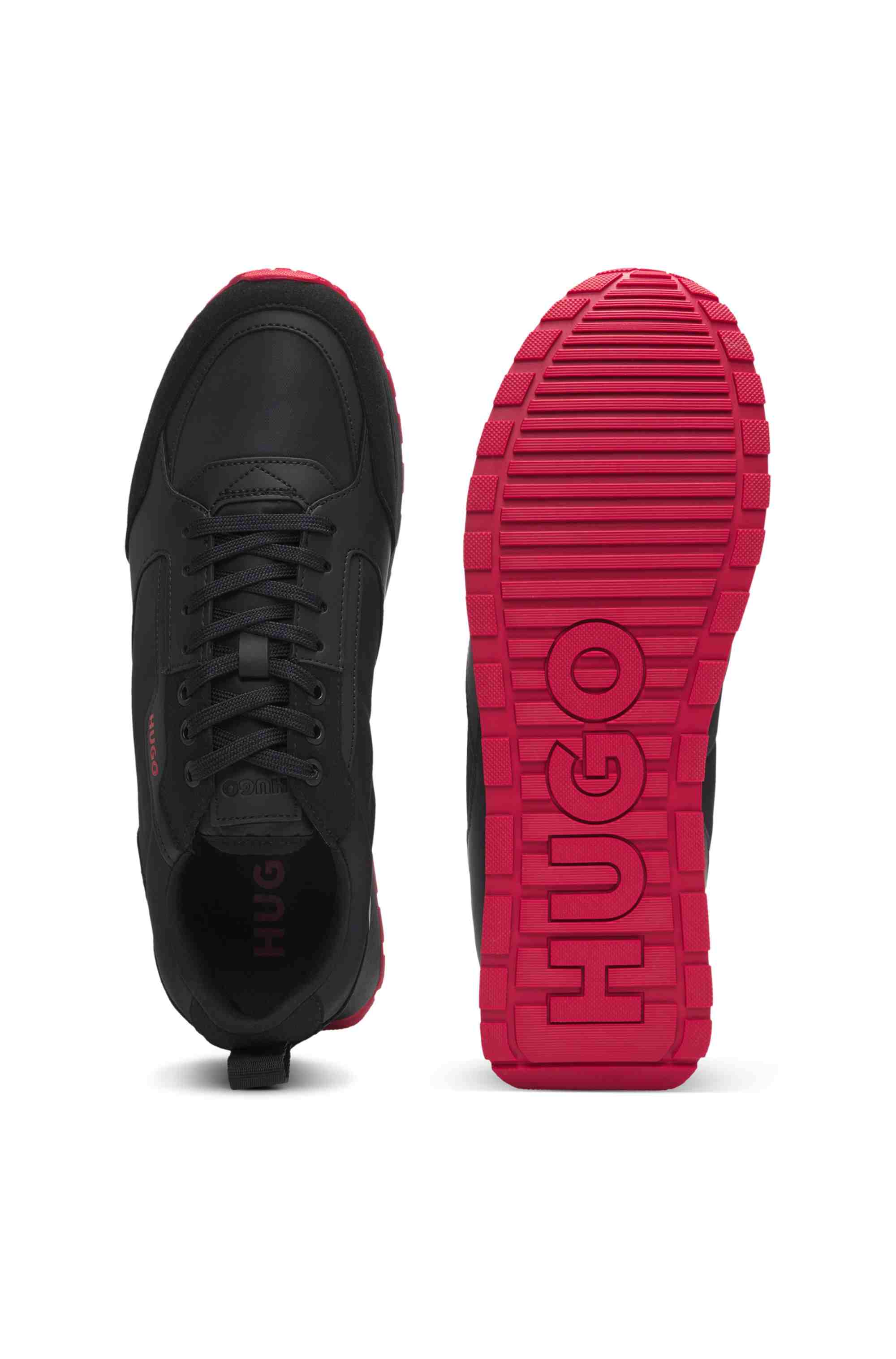 Mixed-material trainers with branded accents