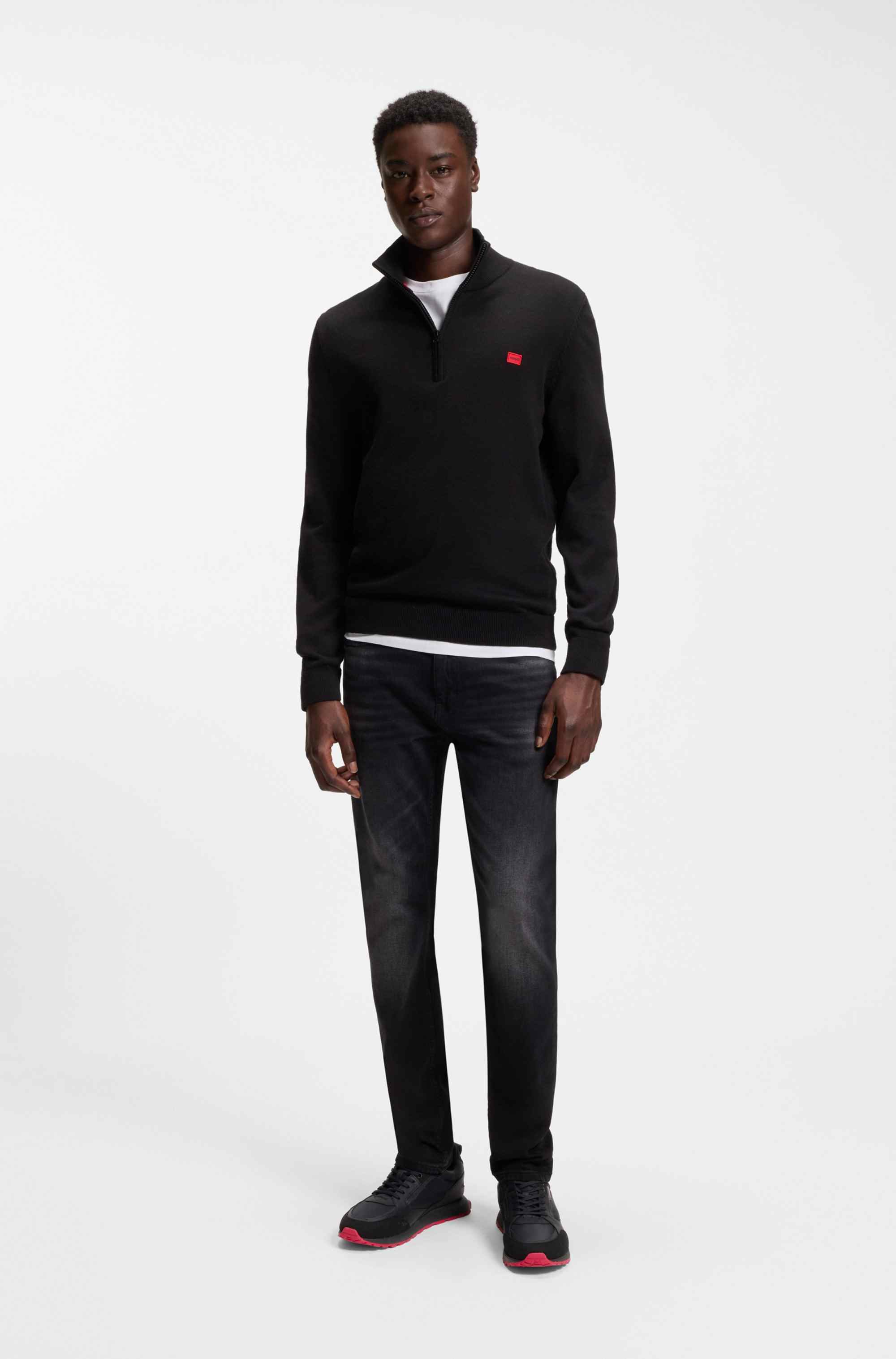 Mixed-material trainers with branded accents