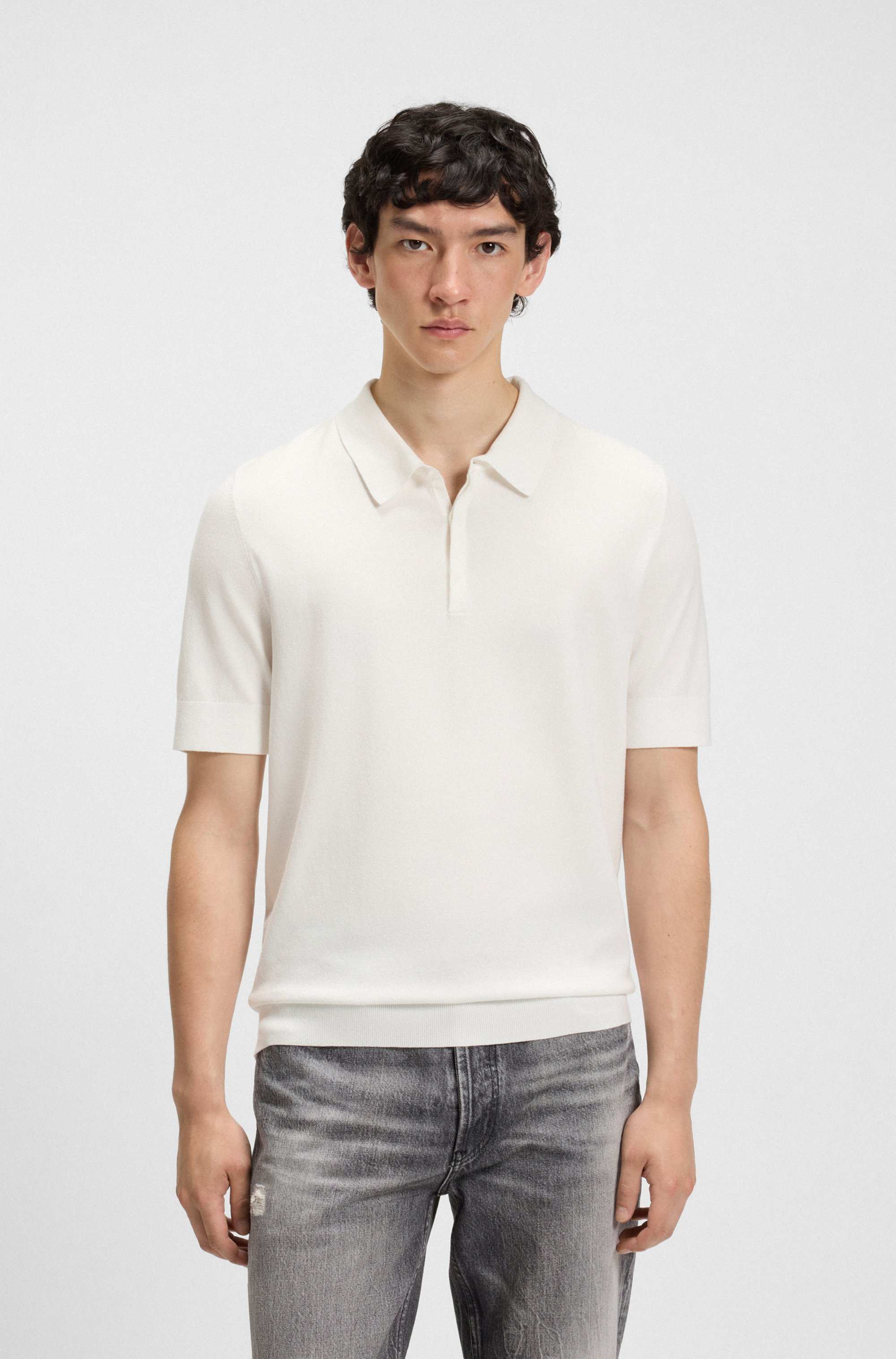 Knit polo with covered placket