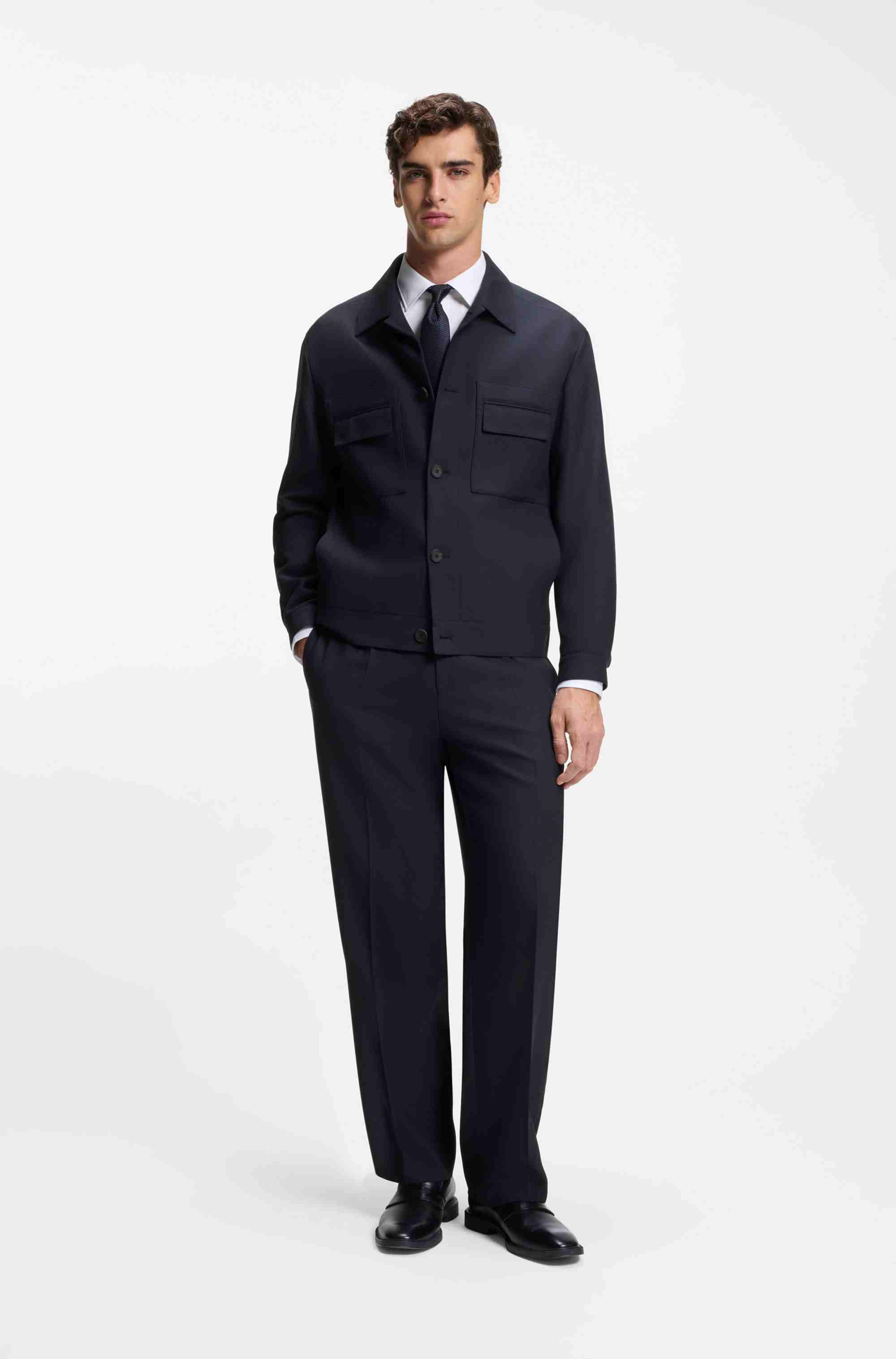 Modern-fit trousers in stretch twill with front crease