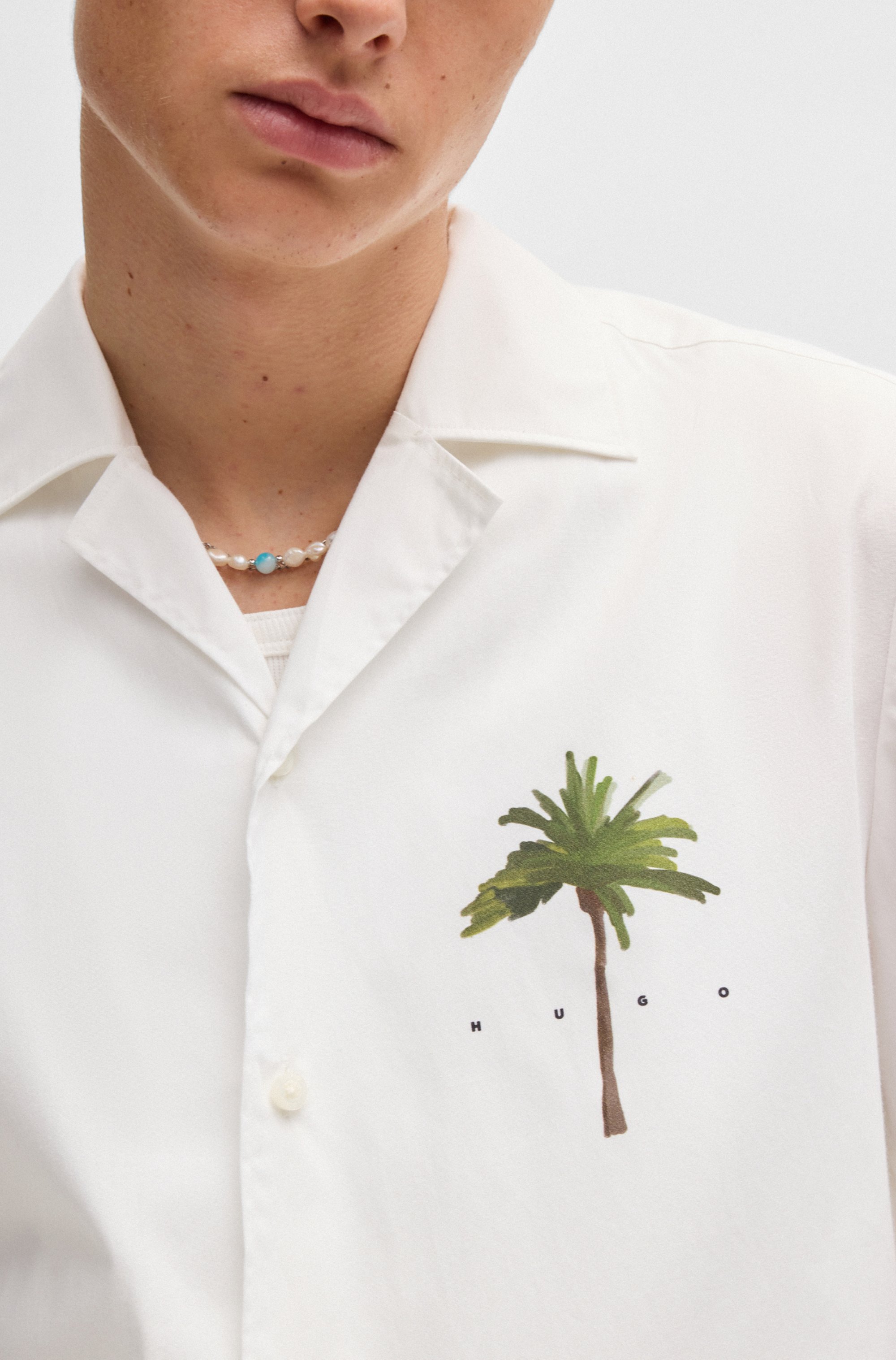 Relaxed-fit shirt in cotton with palm-tree prints