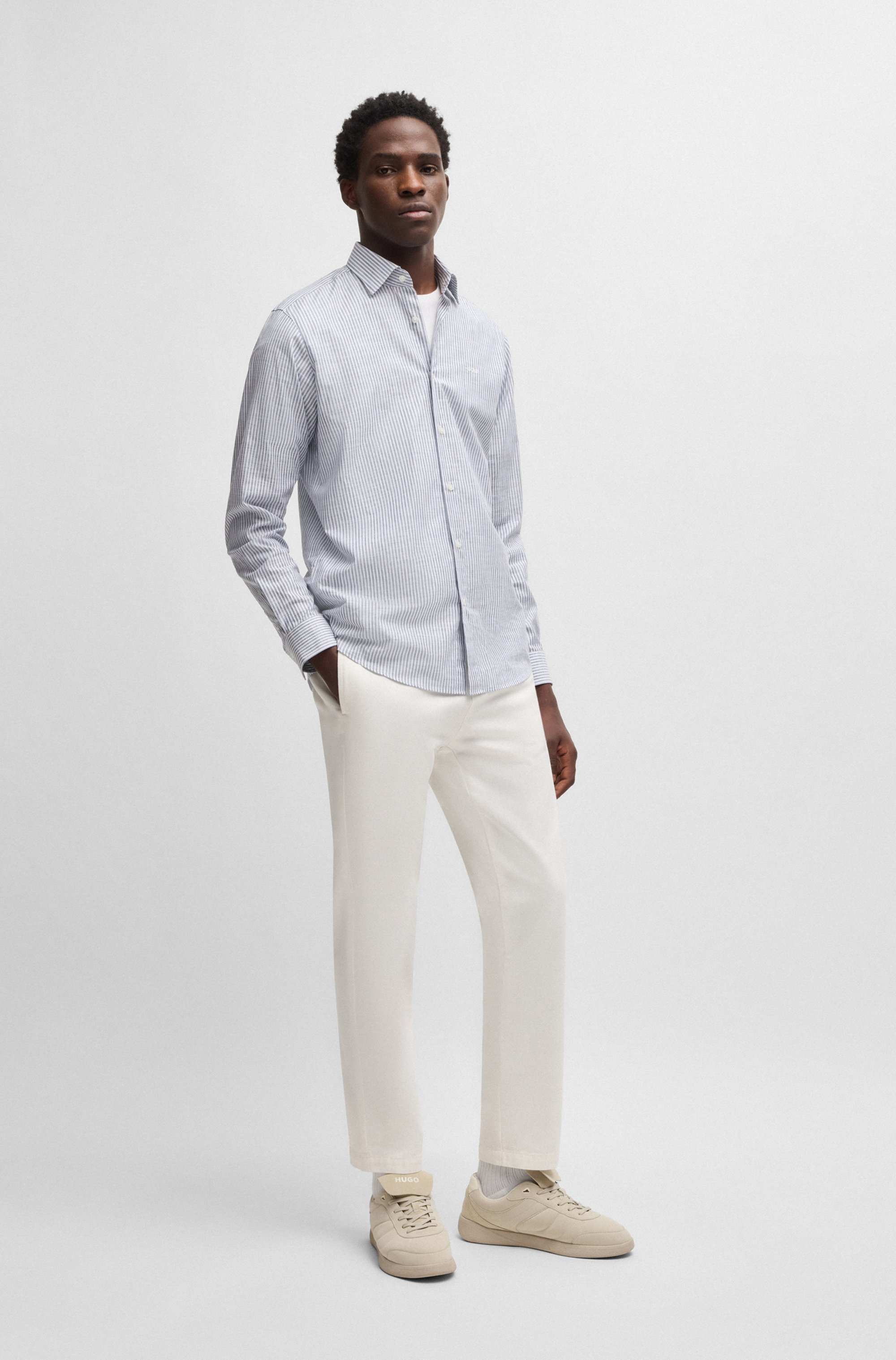 Slim-fit trousers in cotton twill
