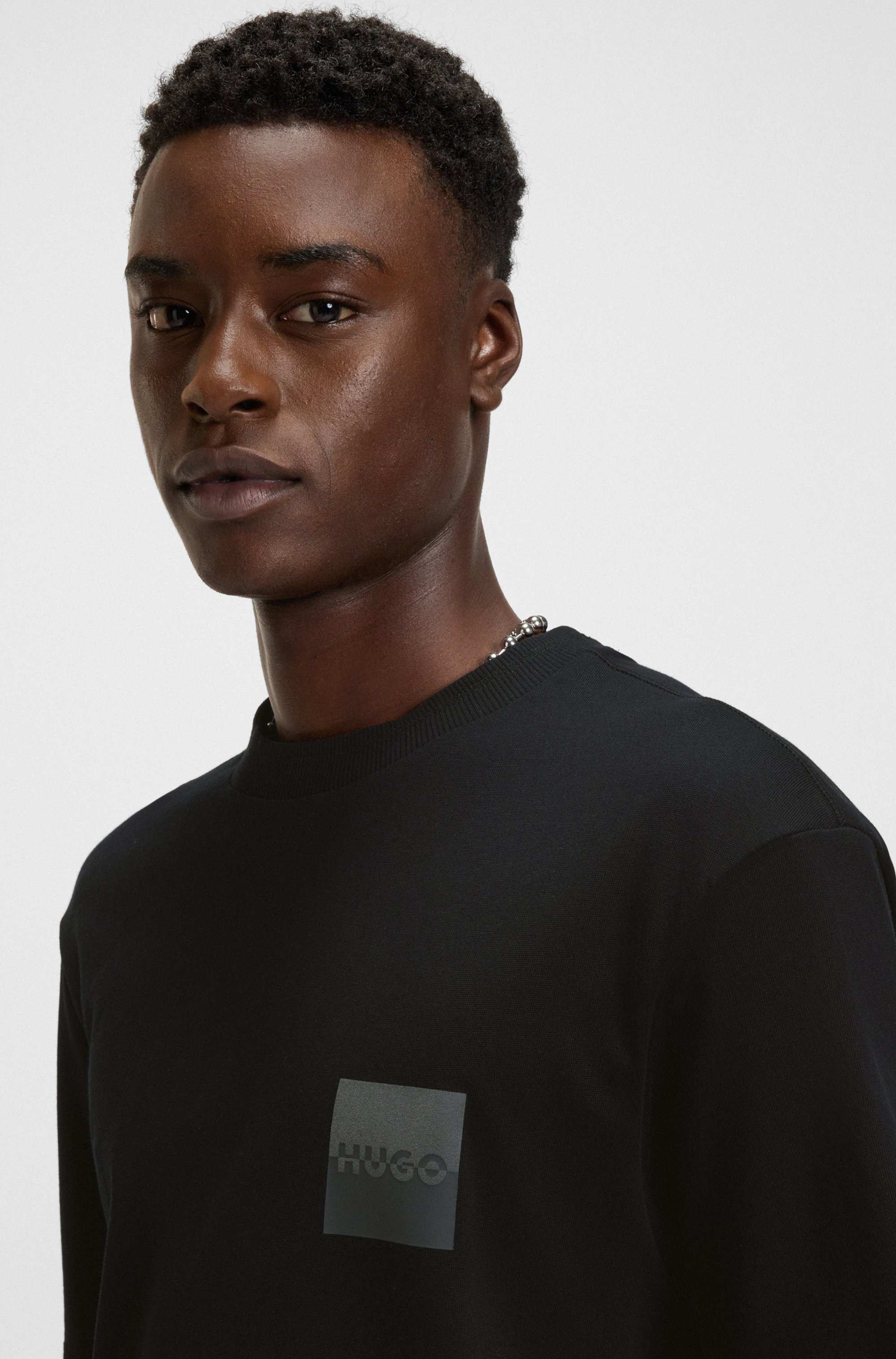 Relaxed-fit T-shirt in cotton with split logos