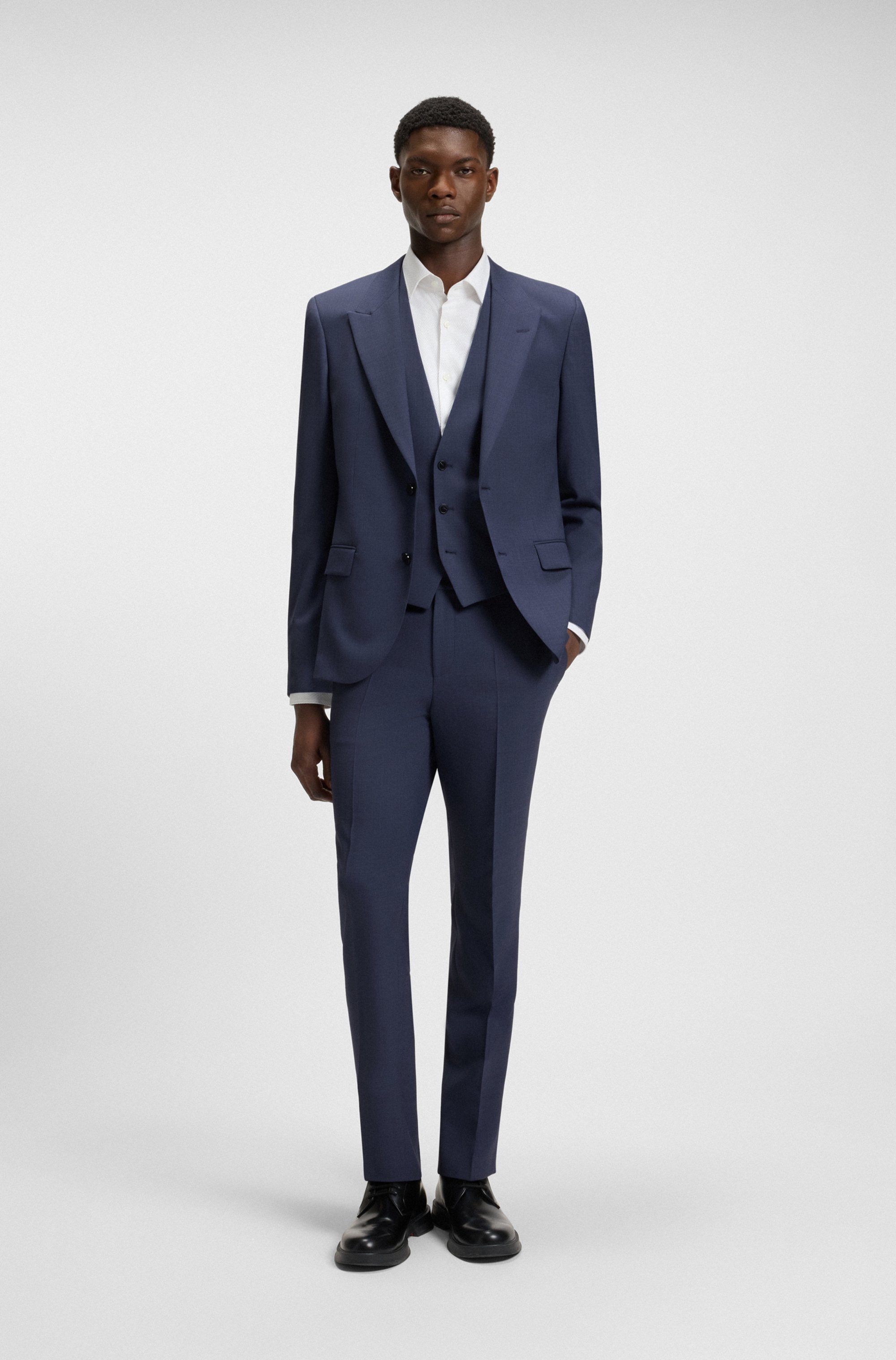 Slim-fit three-piece suit with sharkskin weave
