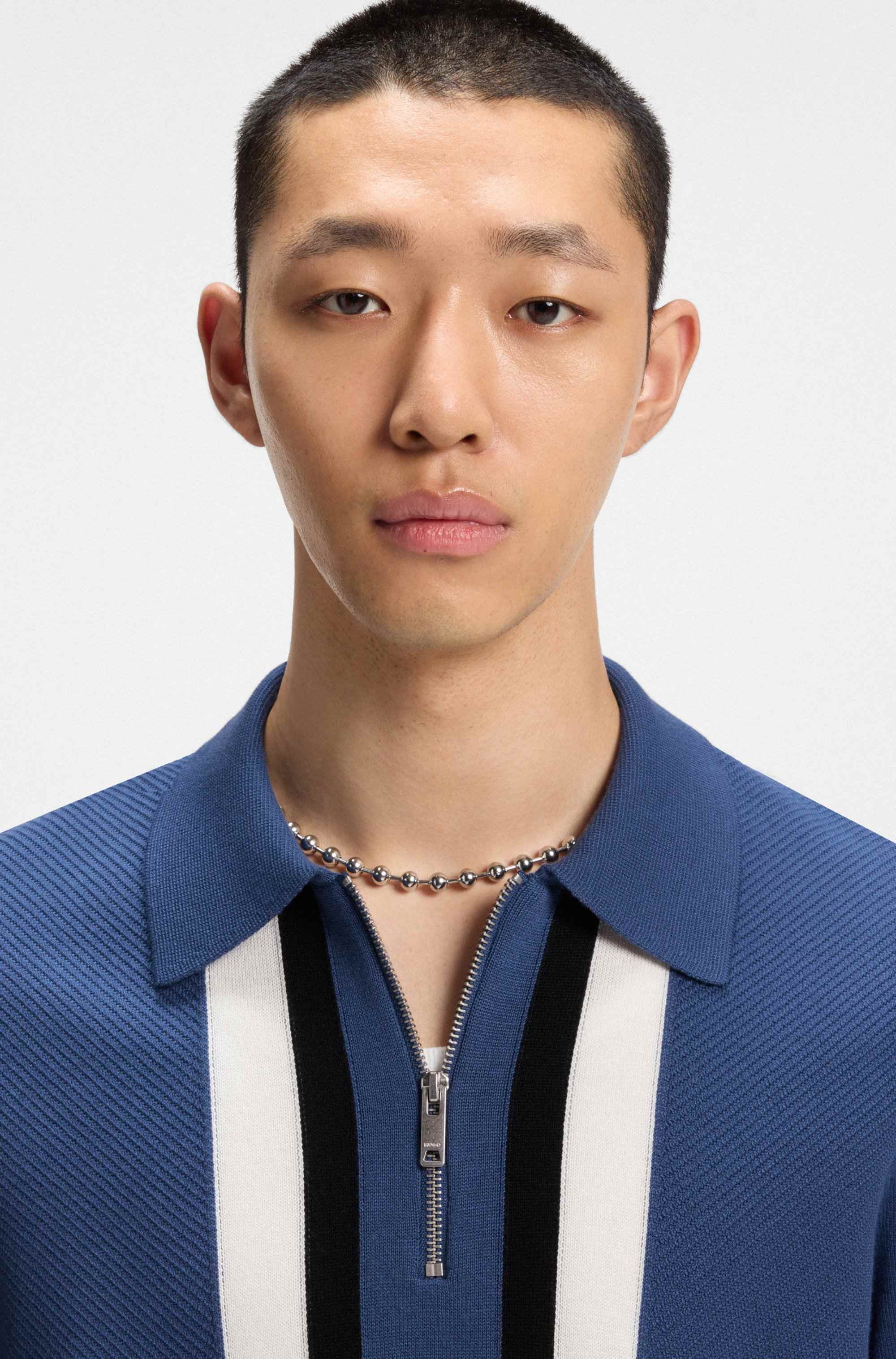 Zip-neck knit sweater with stripe details