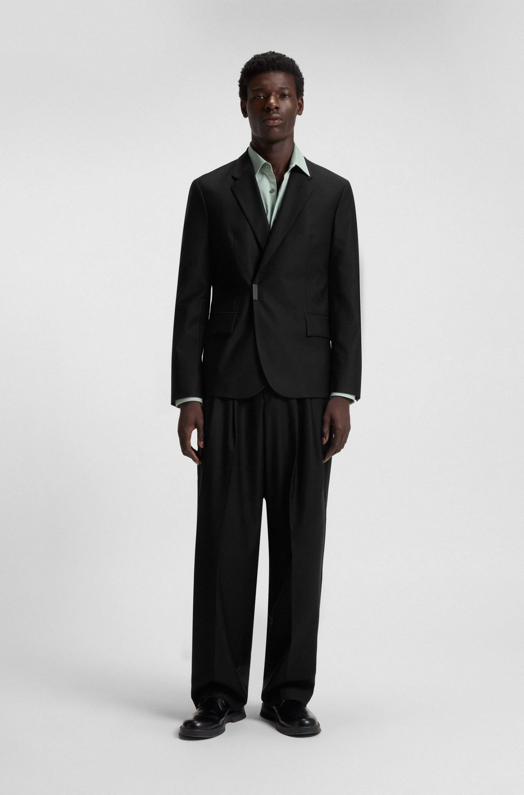 Slim-fit suit jacket with logo closure