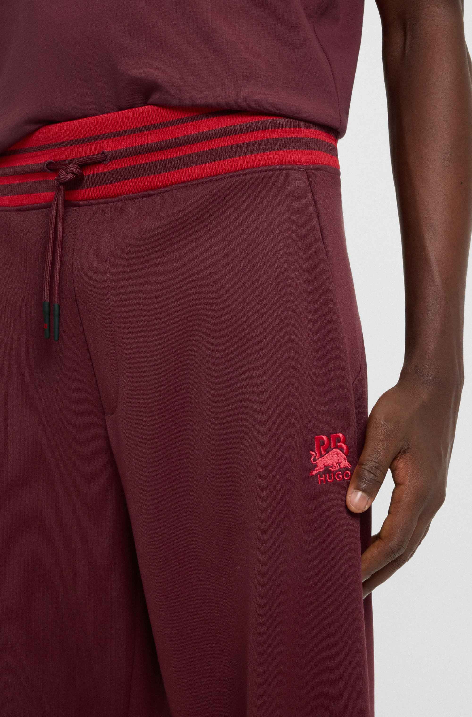 HUGO x RB oversized-fit tracksuit bottoms with striped waistband