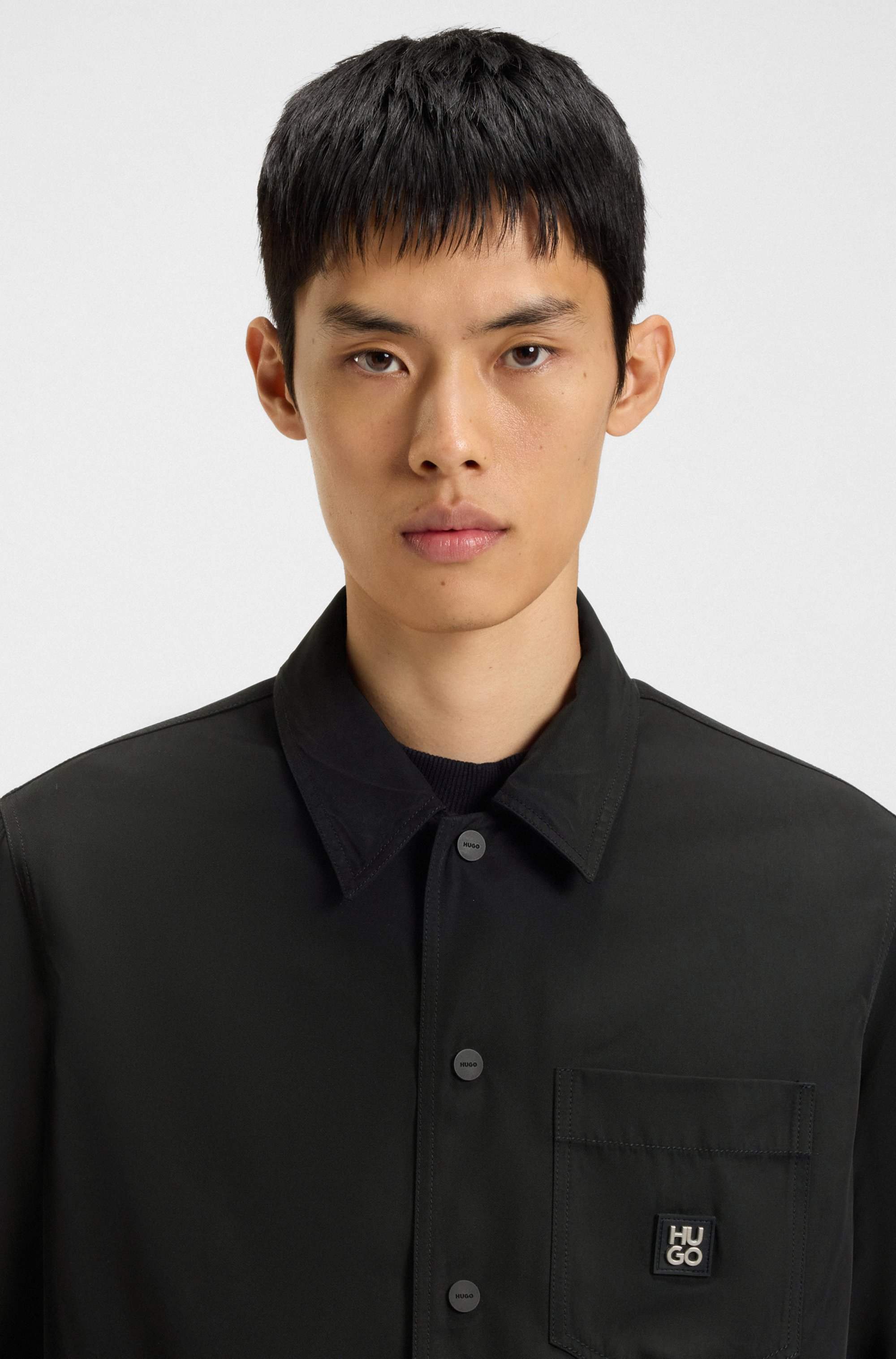 Oversized-fit shirt with stacked-logo badge