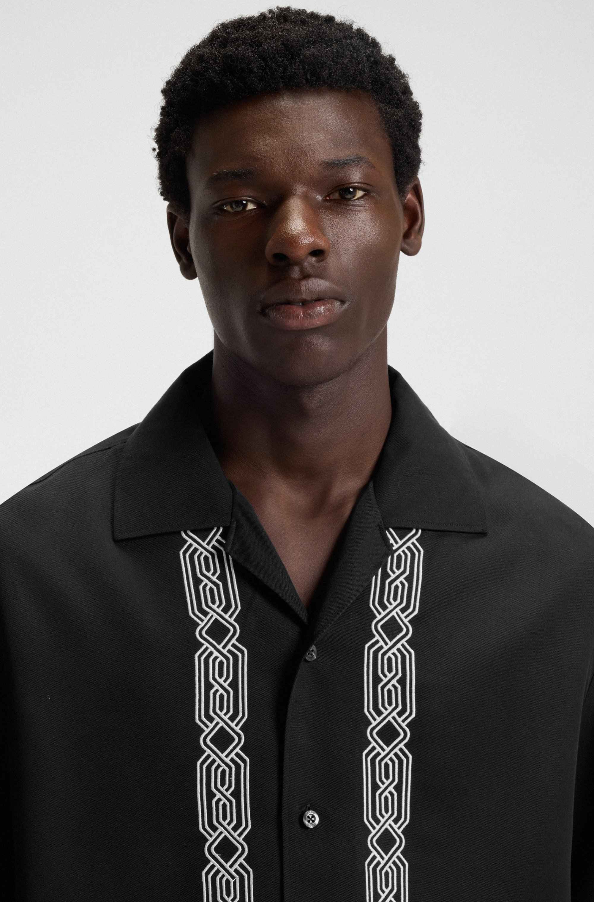 Oversized-fit shirt with embroidered pattern