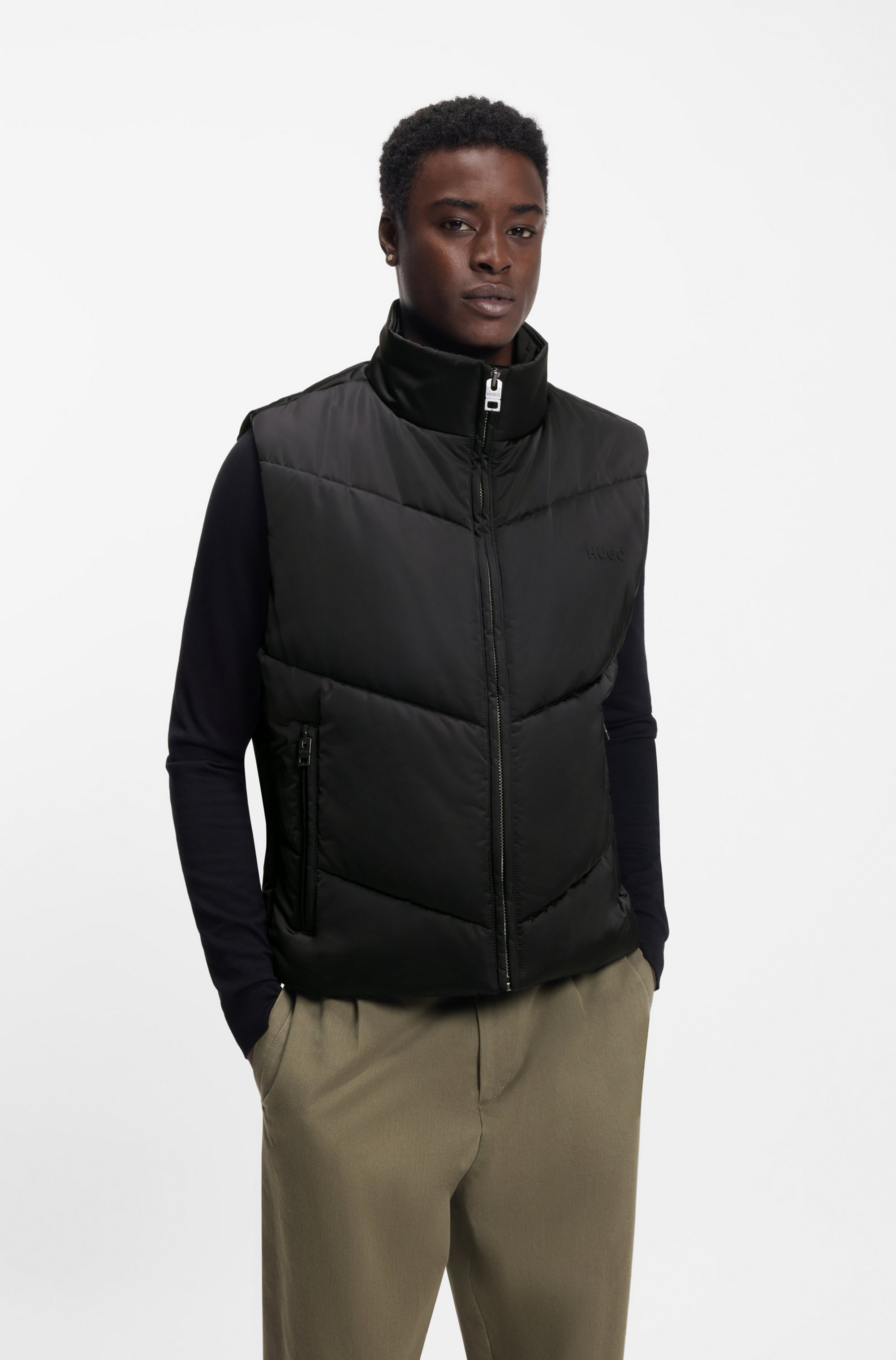 Water-repellent gilet with tonal logo