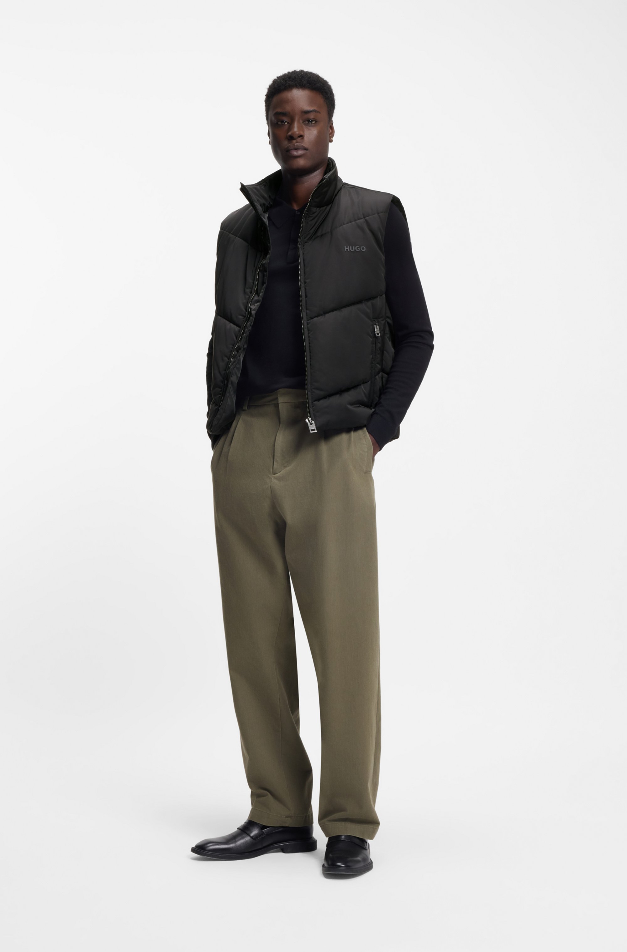 Water-repellent gilet with tonal logo