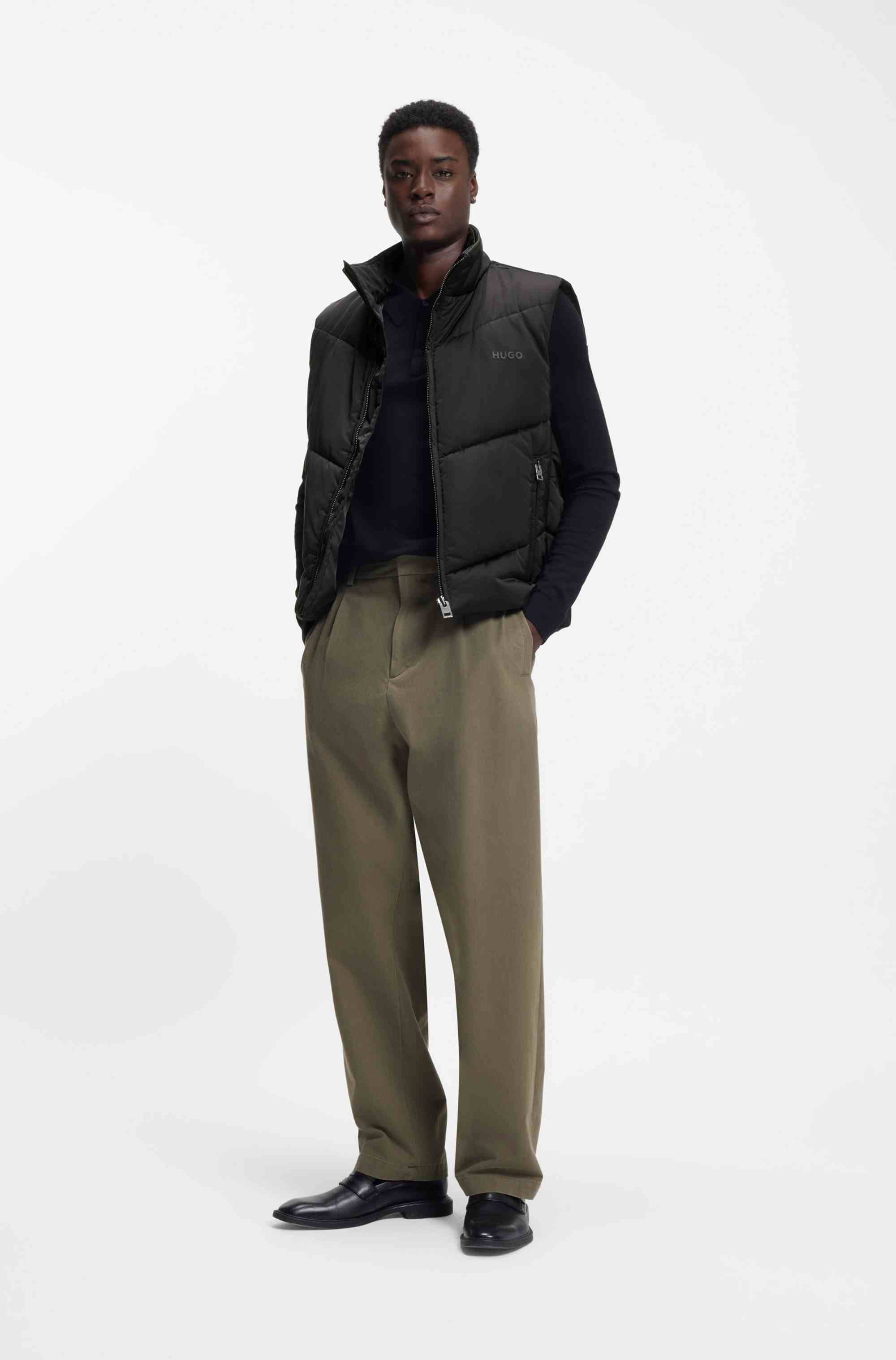 Water-repellent gilet with tonal logo