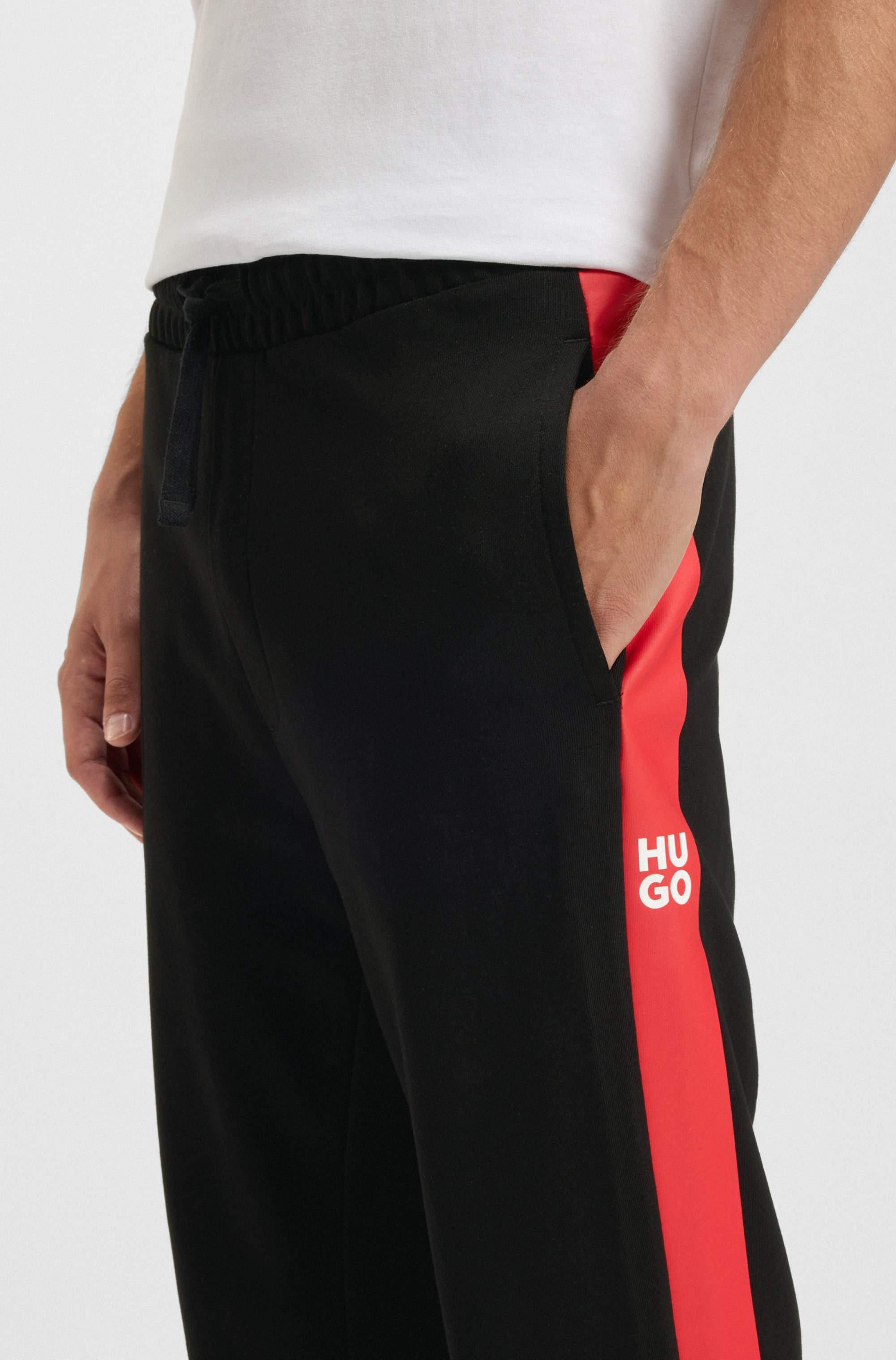 Cotton-terry tracksuit bottoms with contrast side stripes