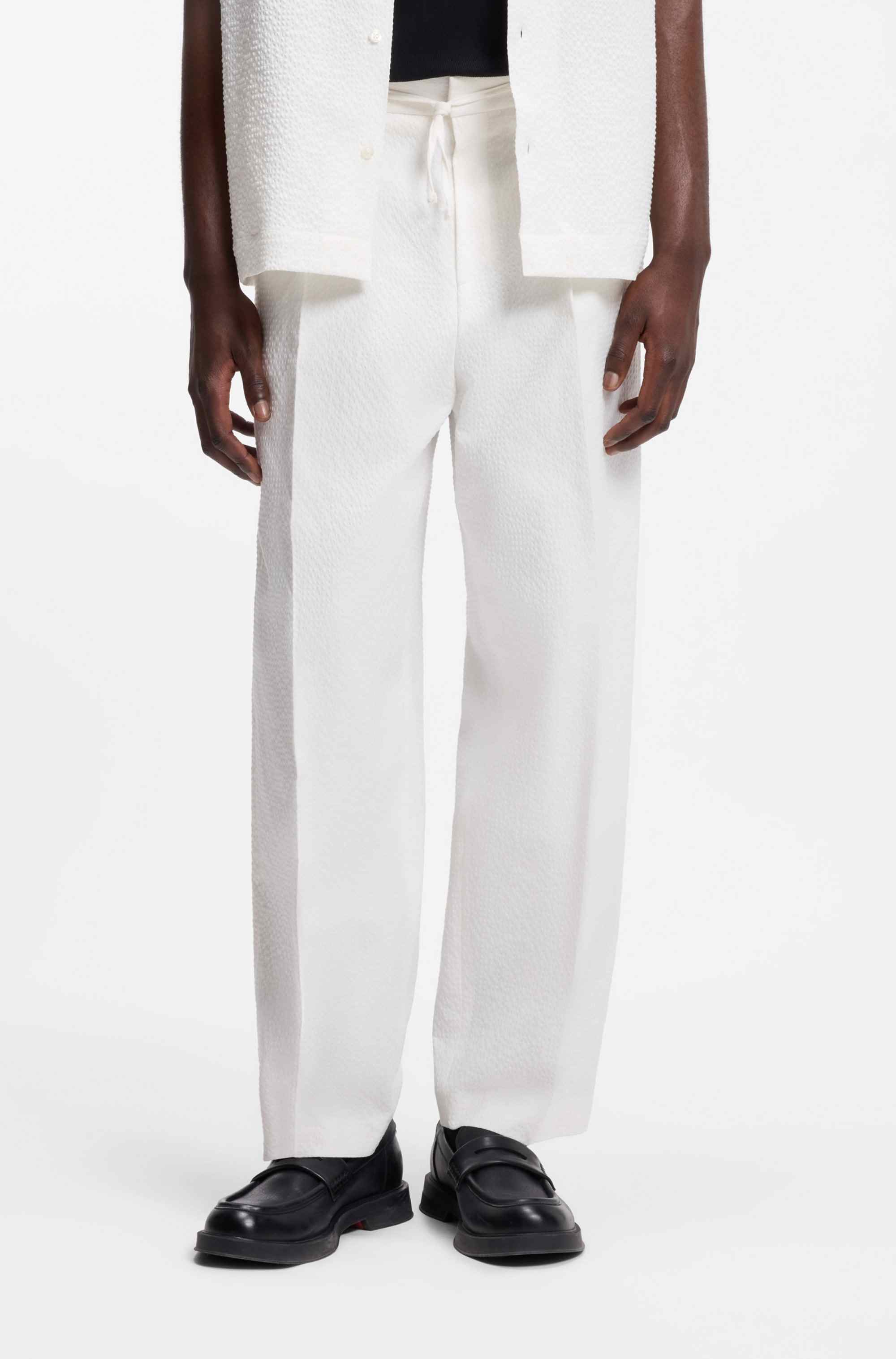 Modern-fit trousers in stretch-cotton seersucker