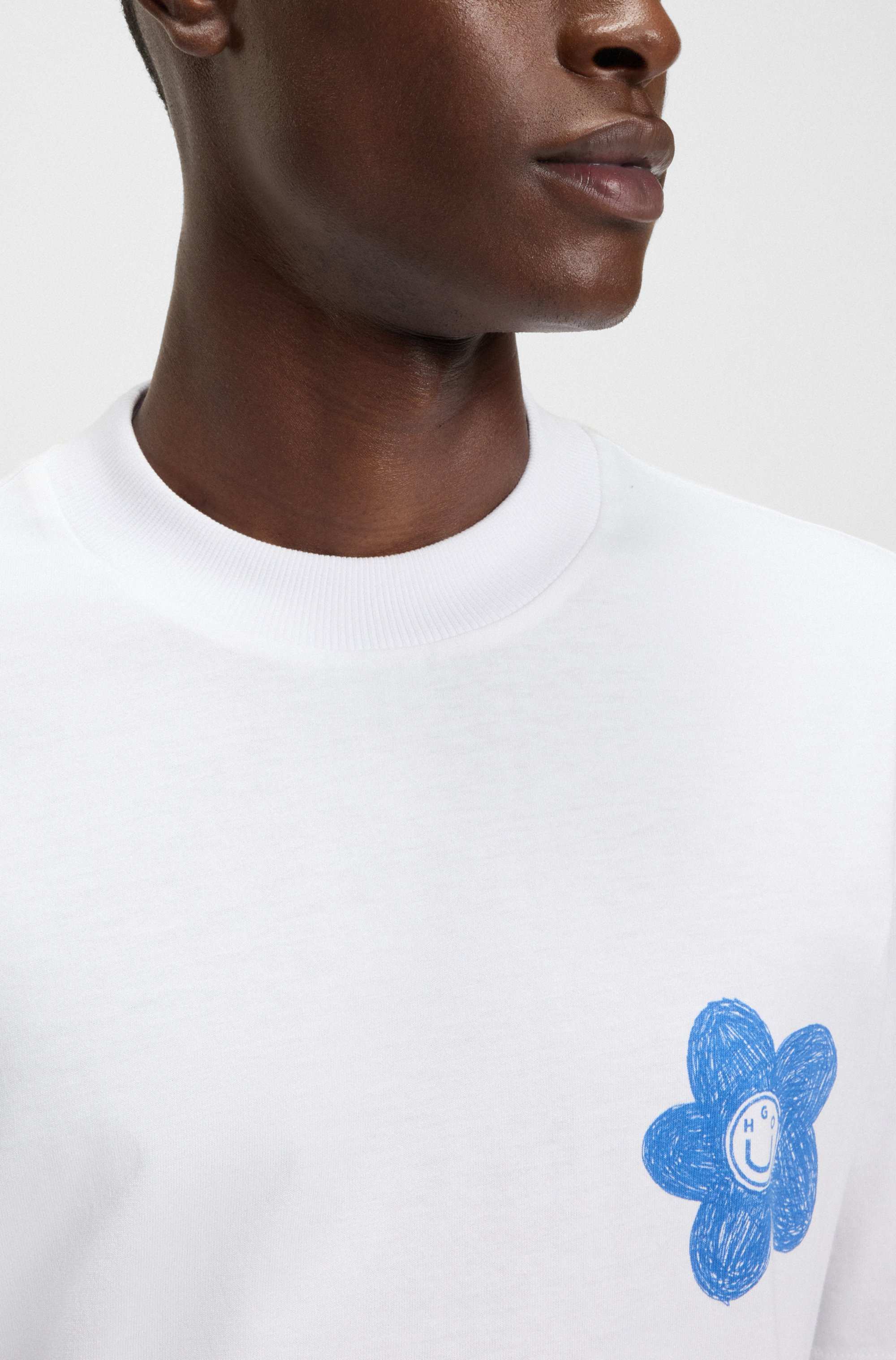 Cotton-jersey T-shirt with Happy HUGO logo artwork